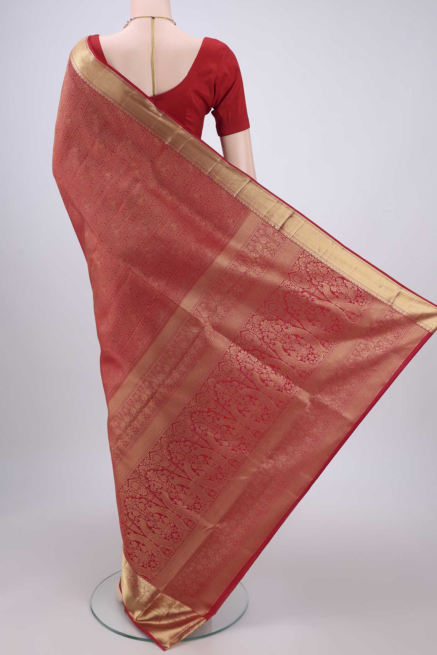 Flat view of Red Dual Tone Soft Silk Saree with Zari Brocade on the body and Zari Border. 