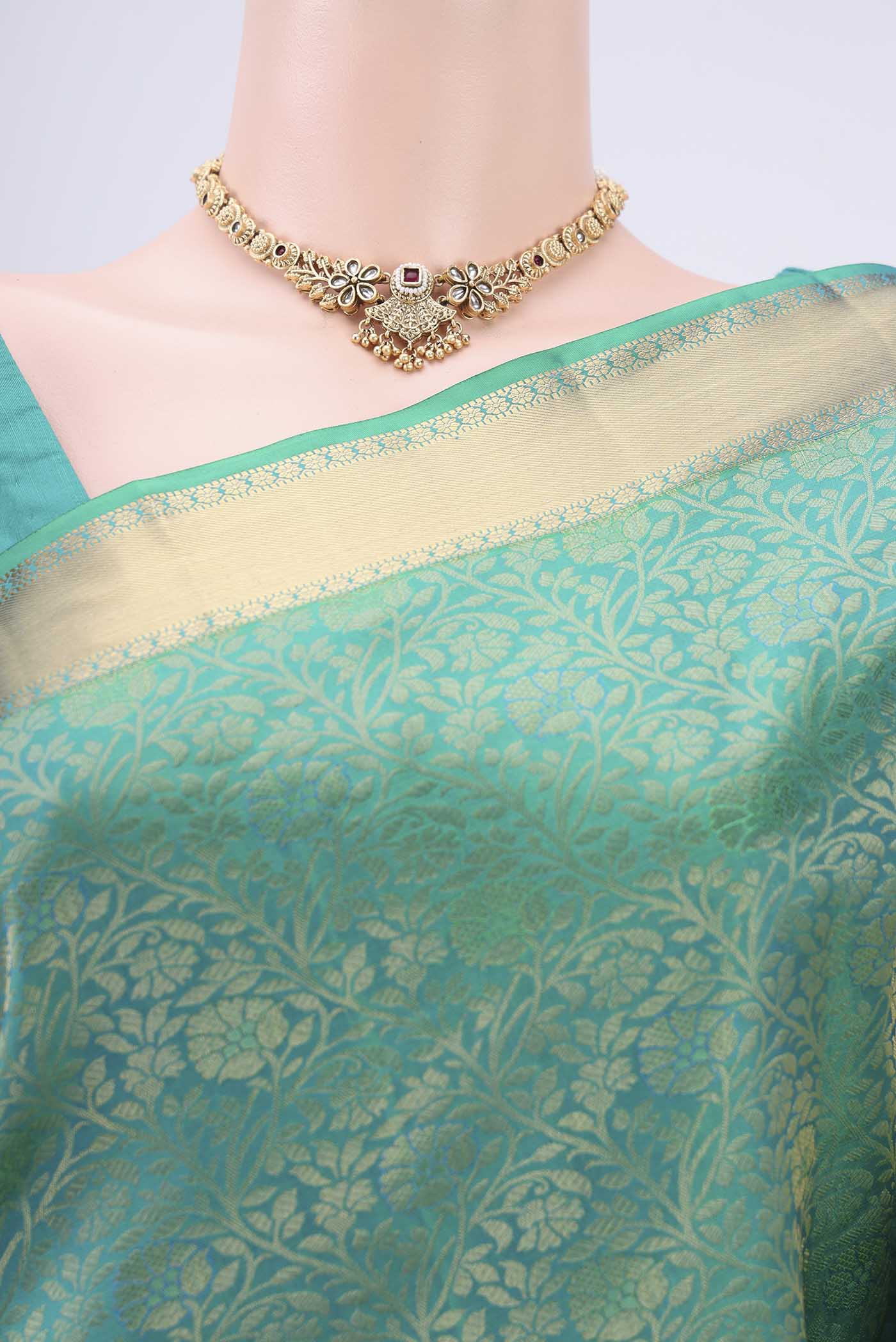 Border image of Sea Green Dual Tone Soft Silk Saree with Zari Brocade on the body and Zari Border. 