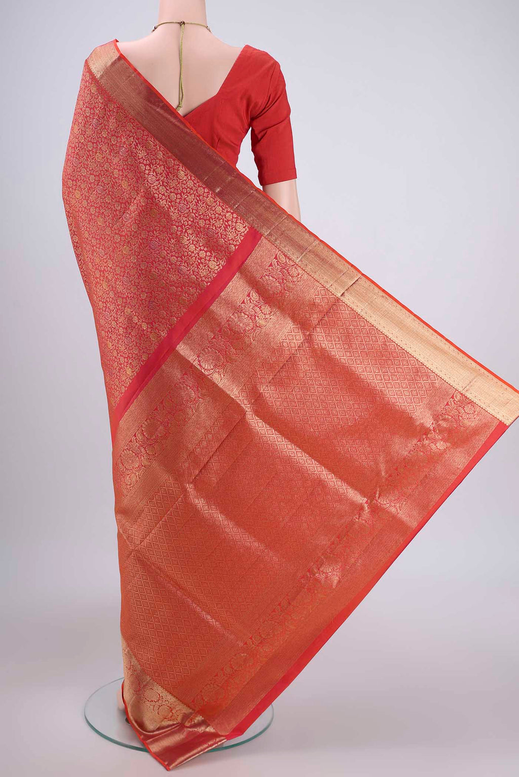 Flat view of Brick Orange Dual Tone Soft Silk Saree with Zari Brocade on the body and Zari Border. 