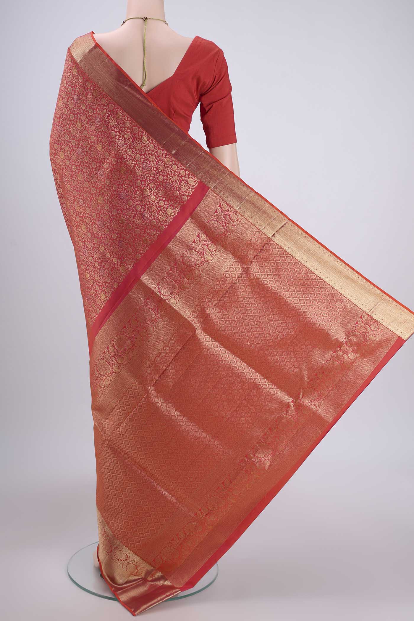 Flat view of Brick Orange Dual Tone Soft Silk Saree with Zari Brocade on the body and Zari Border. 