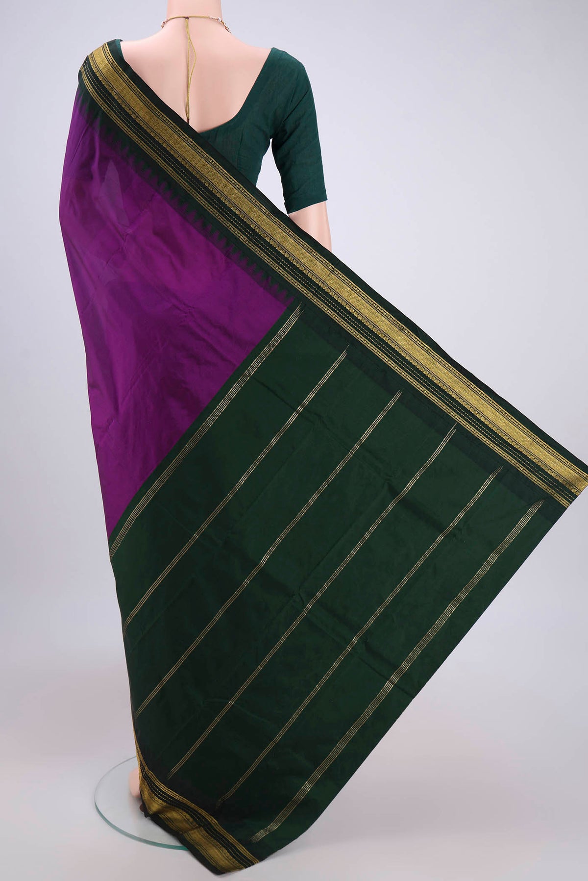 Flat view of Purple Bangalore Silk Saree with Plain Body and Temple Border. 