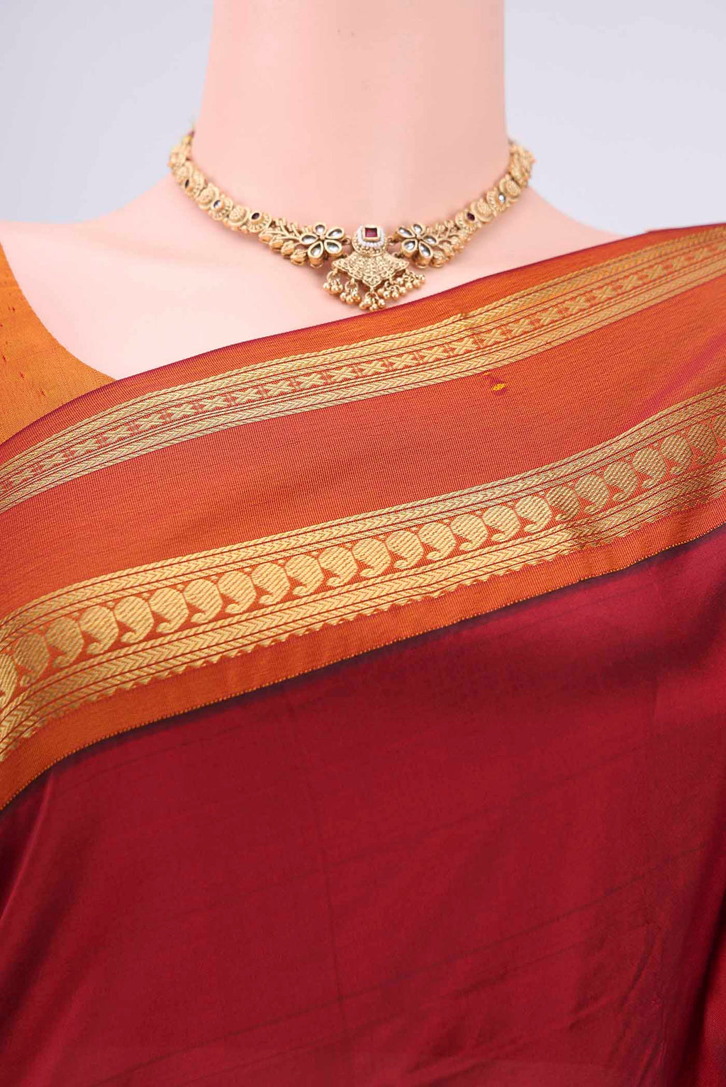 Border image of Maroon Bangalore Silk Saree with Plain Body and Zari Border. 