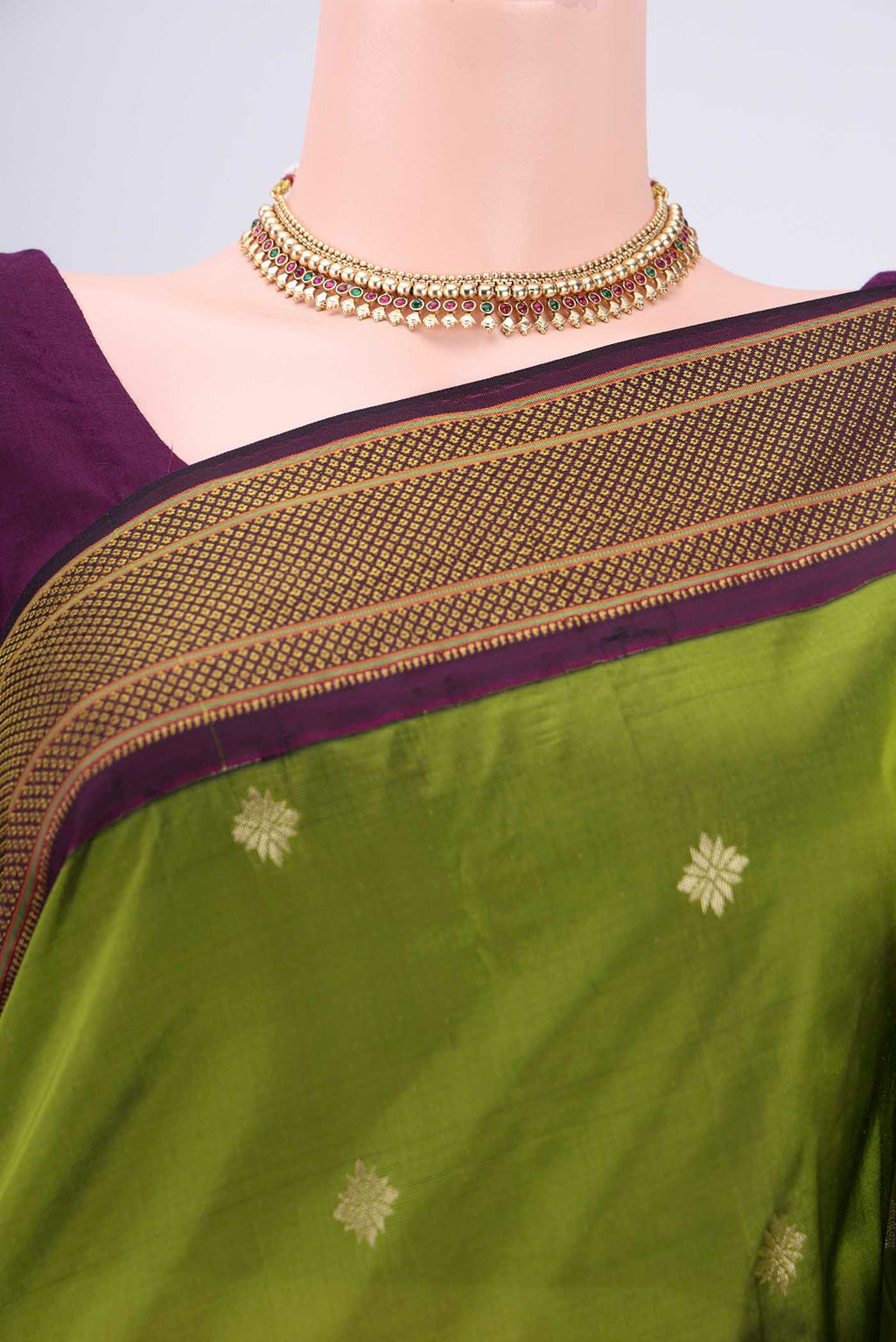 Border image of Green Blended Bangalore Silk Saree with Zari Butta on the body and Zari Border. 