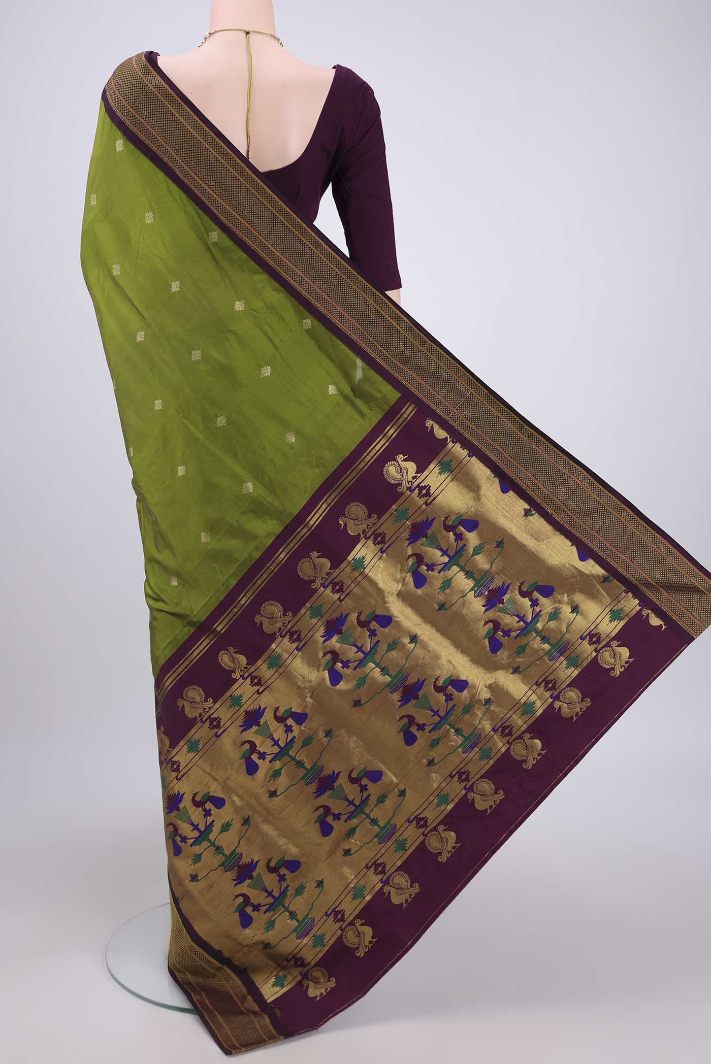 Flat view of Green Blended Bangalore Silk Saree with Zari Butta on the body and Zari Border. 