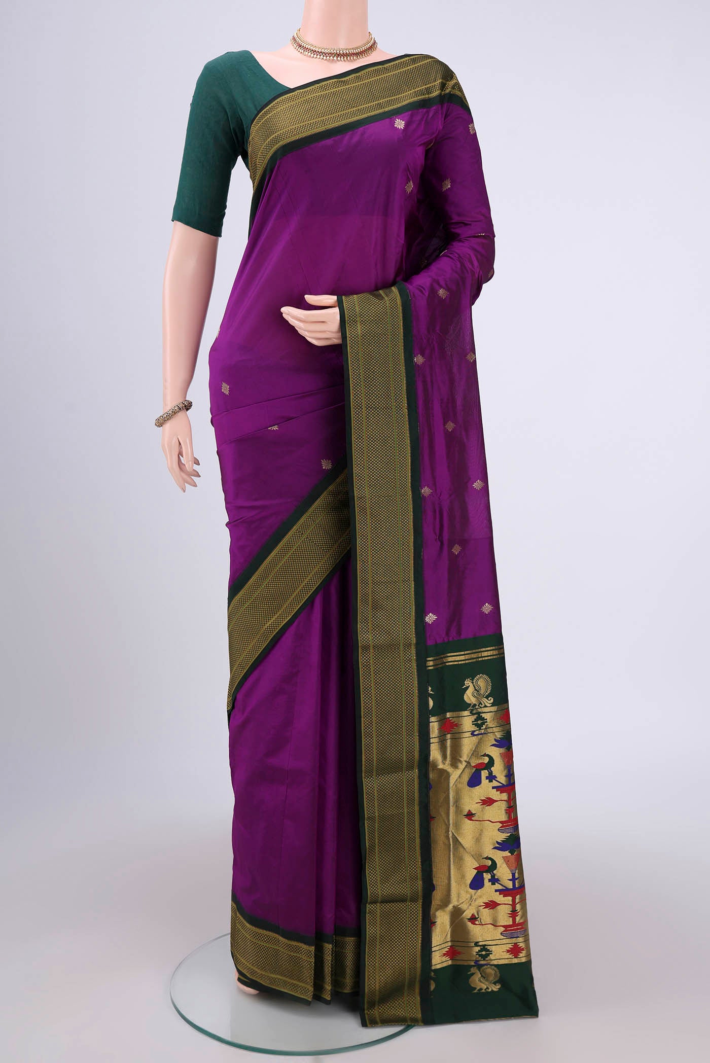 Magenta Blended Bangalore Silk Saree with Zari Butta on the body and Zari Border.  displayed on a mannequin