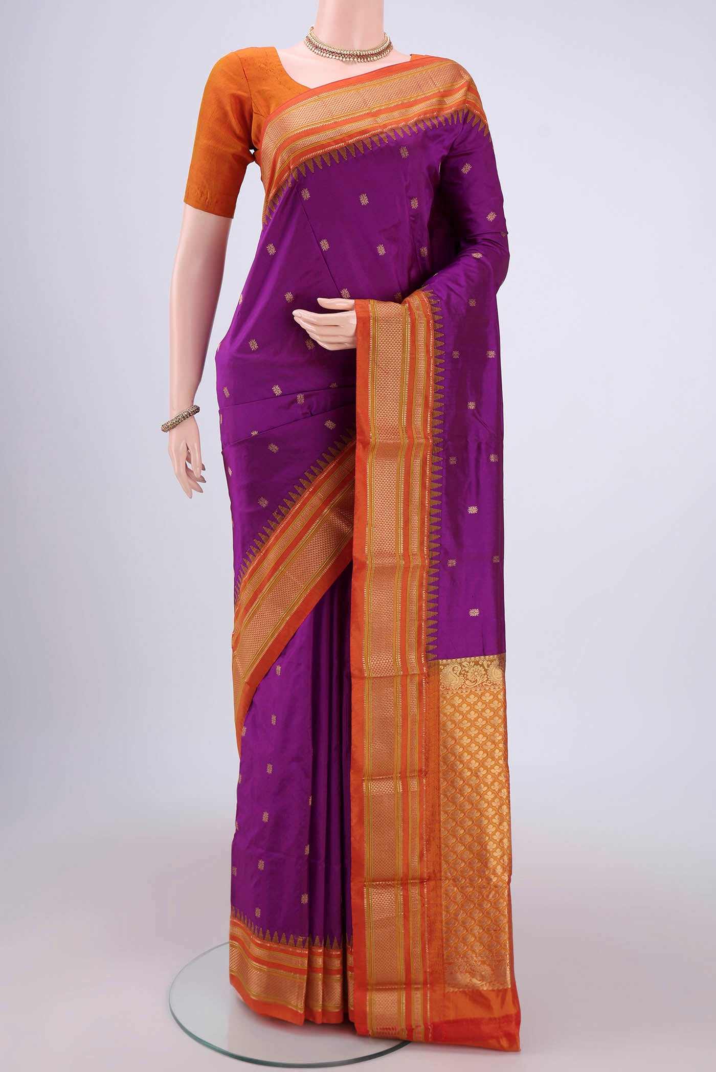 Magenta Bangalore Silk - kadyal Saree with Zari Butta on the body and Zari Border.  displayed on a mannequin
