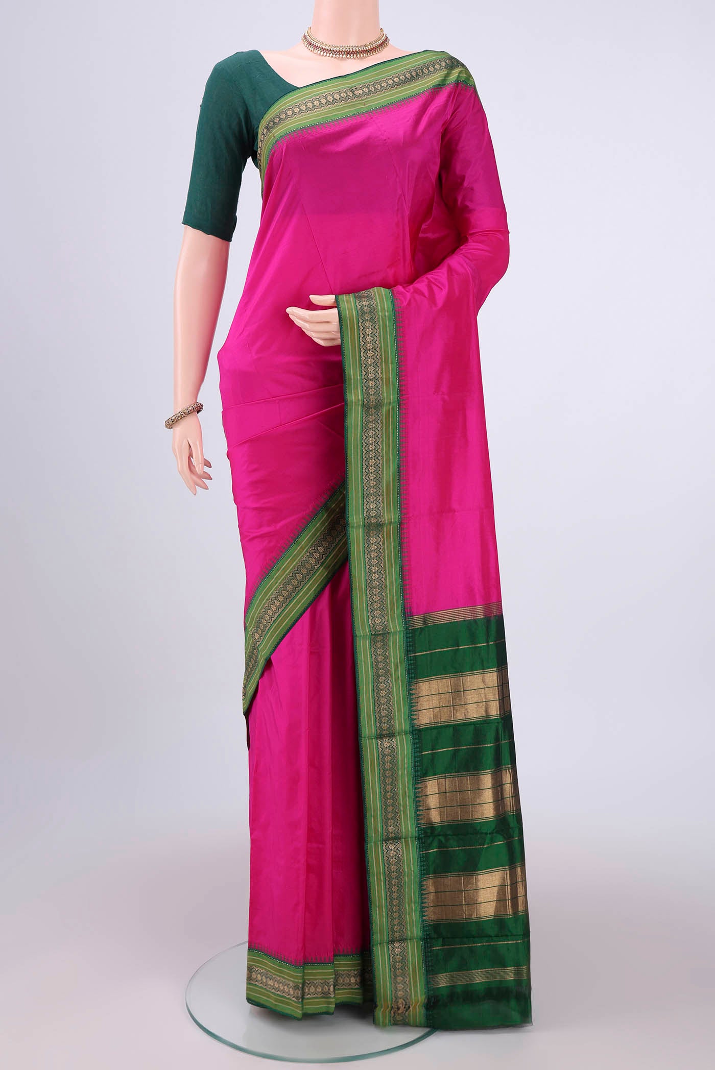 Dark Pink Bangalore Silk - kadyal Saree with Plain Body and Zari Border.  displayed on a mannequin