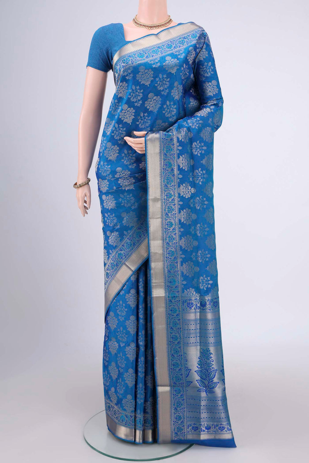 Orange with Pink Dual Tone Soft Silk Saree with Zari Brocade on the body and Zari Border.  displayed on a mannequin