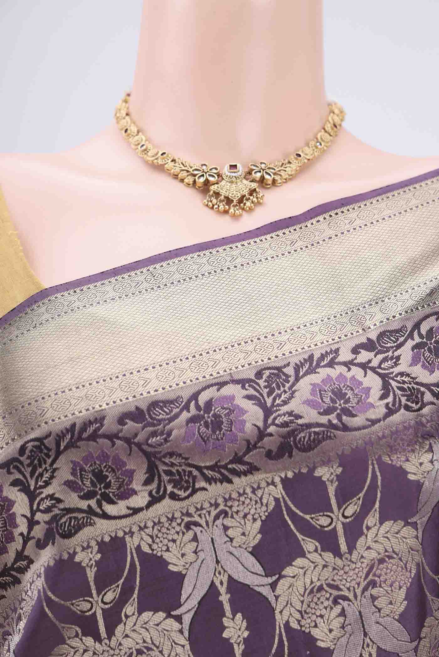 Border image of Burgundy Soft Silk Saree with Zari Brocade on the body and Zari Border. 