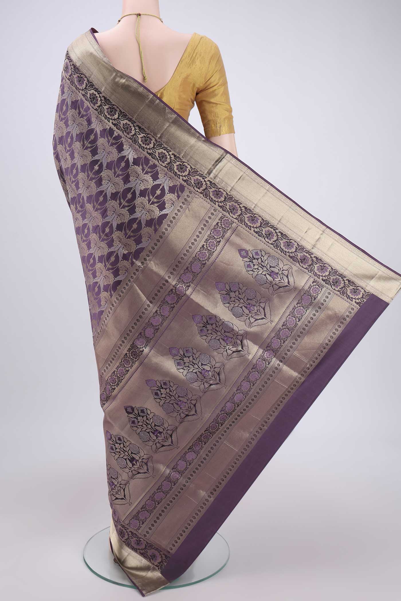 Flat view of Burgundy Soft Silk Saree with Zari Brocade on the body and Zari Border. 