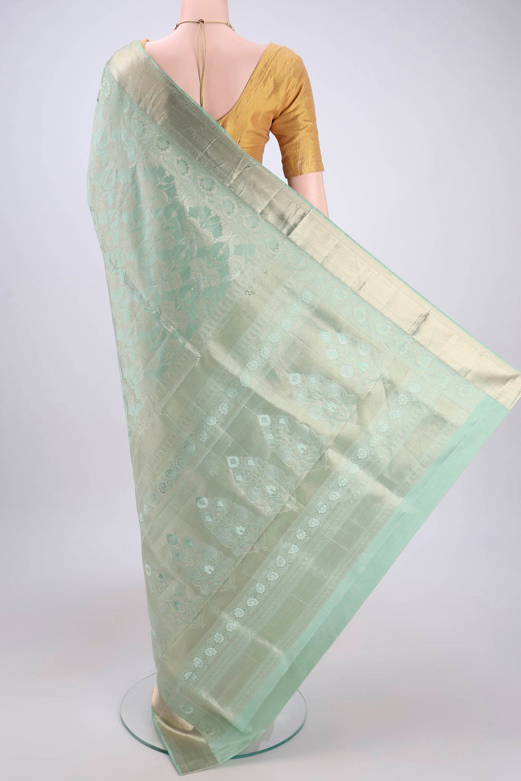Flat view of Sage Green Dual Tone Soft Silk Saree with Zari Brocade on the body and Zari Border. 