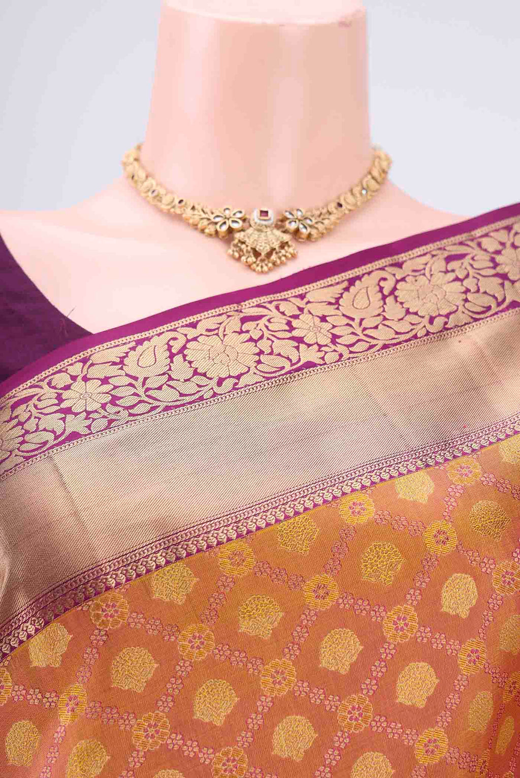 Border image of Pinkish Yellow Soft Silk Saree with Zari Brocade on the body and Zari Border. 