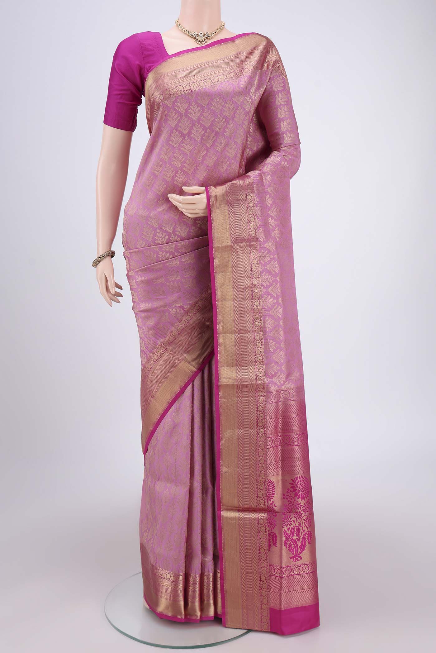 Rose pink Dual Tone Soft Silk Saree with Zari Brocade on the body and Zari Border.  displayed on a mannequin