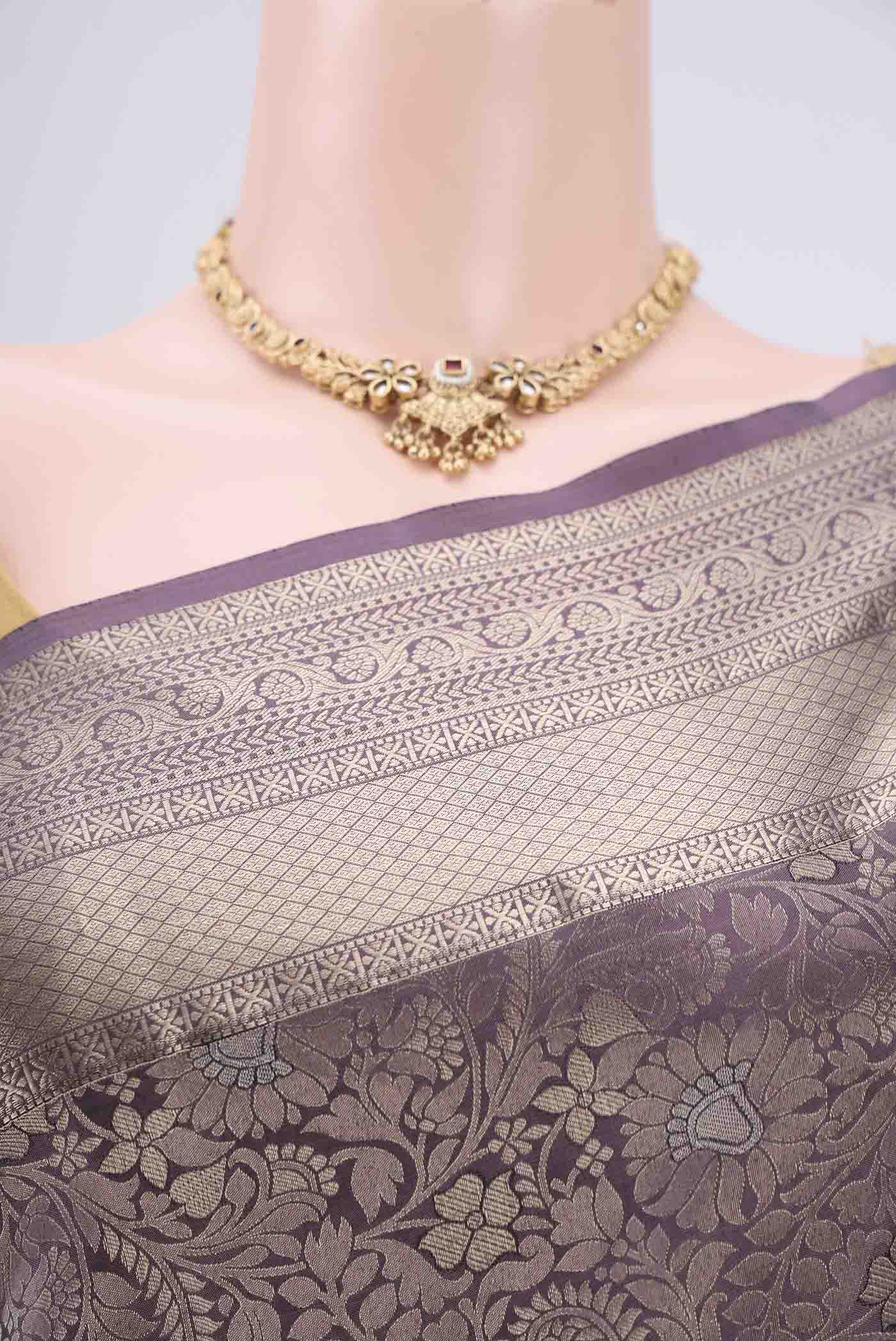 Border image of Burgundy Soft Silk Saree with Zari Brocade on the body and Zari Border. 