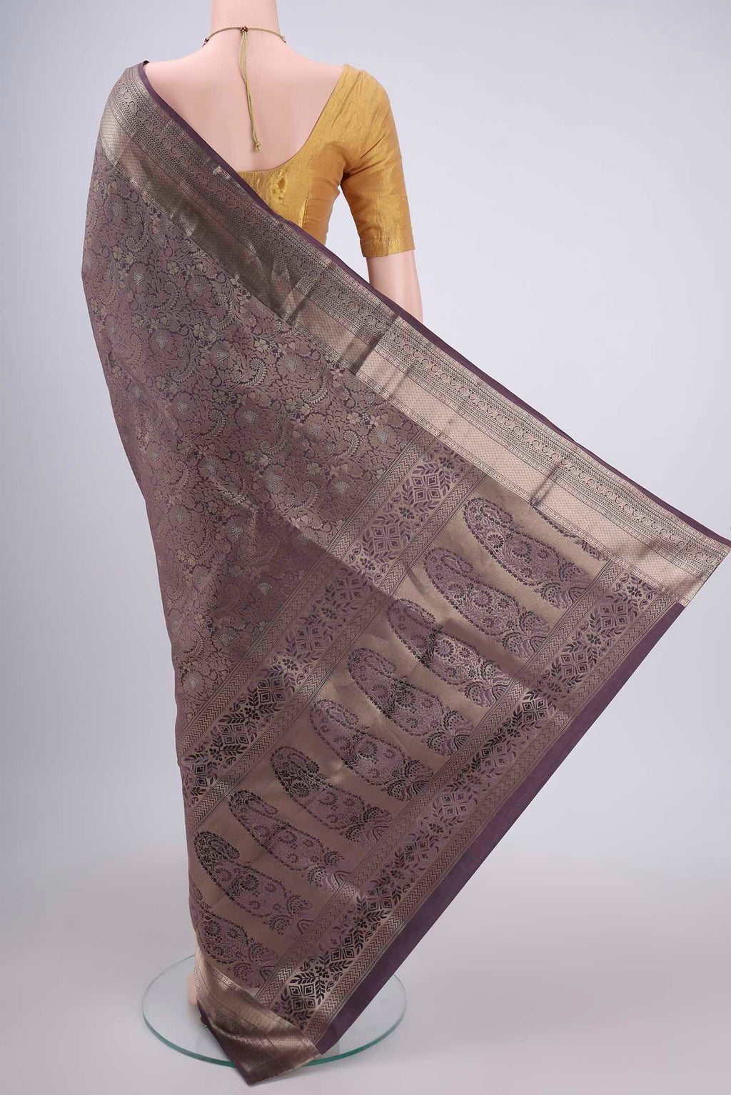 Flat view of Burgundy Soft Silk Saree with Zari Brocade on the body and Zari Border. 