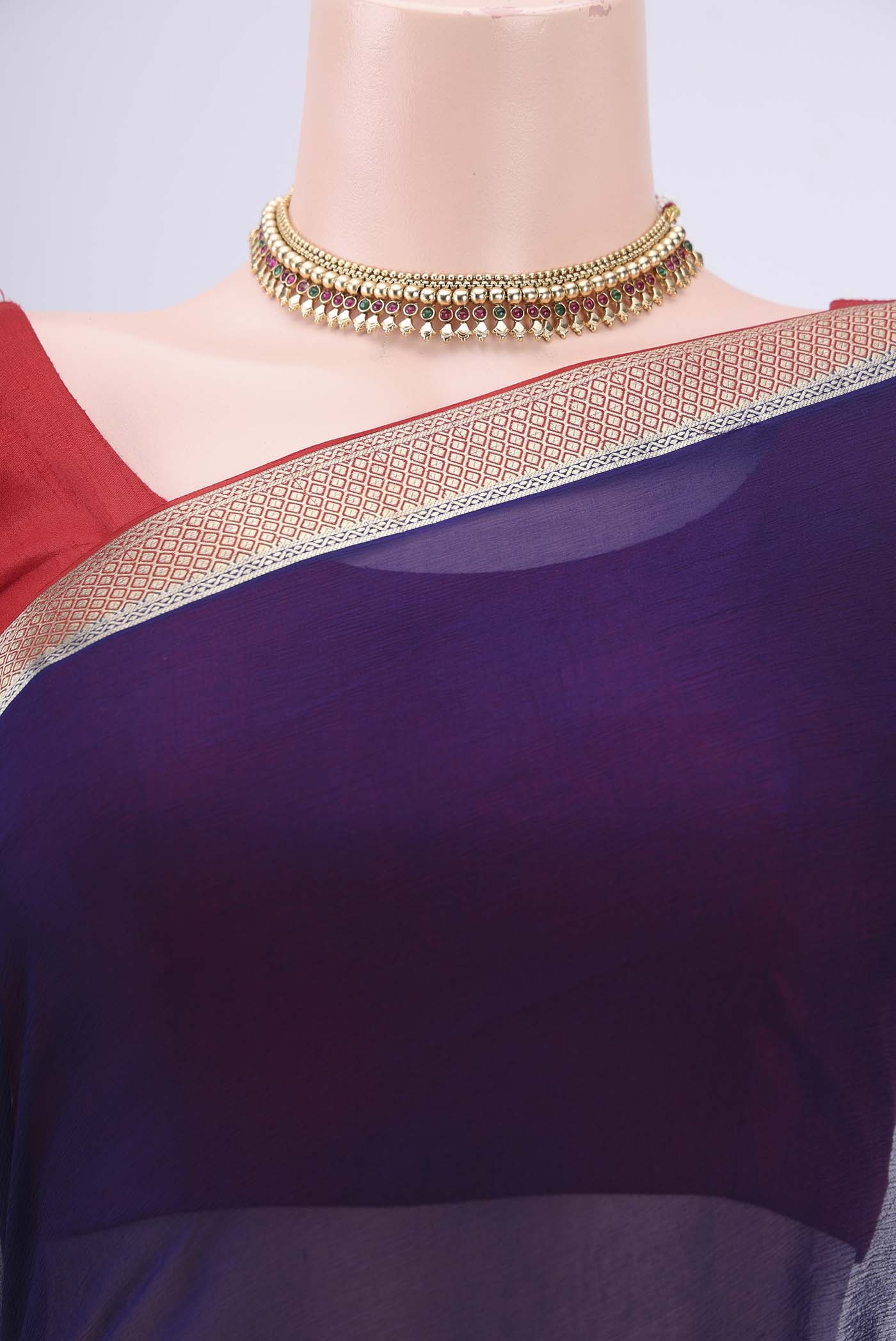 Border image of Purple Dual Tone Chiffon Saree with Plain Body and Zari Border. 