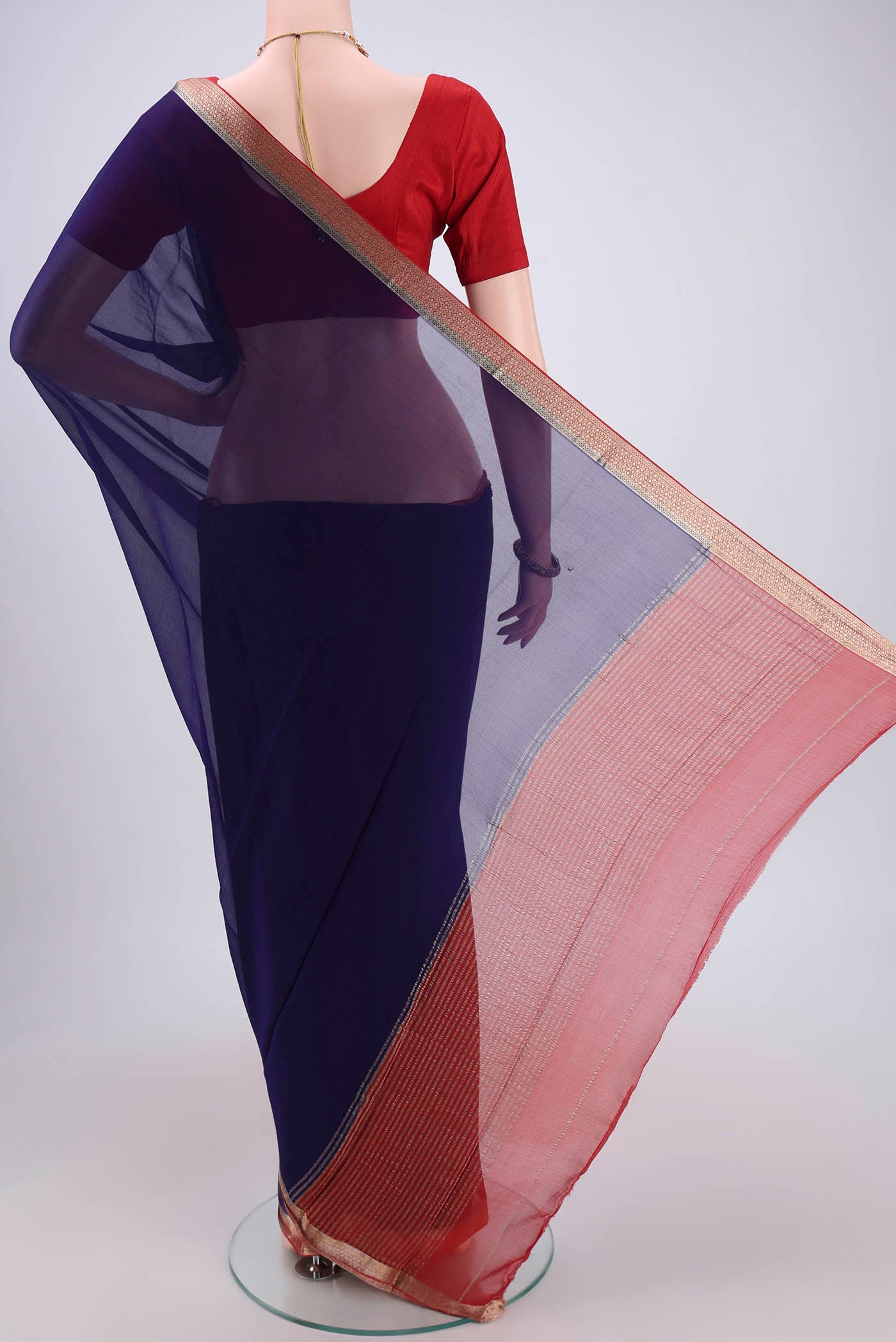 Flat view of Purple Dual Tone Chiffon Saree with Plain Body and Zari Border. 