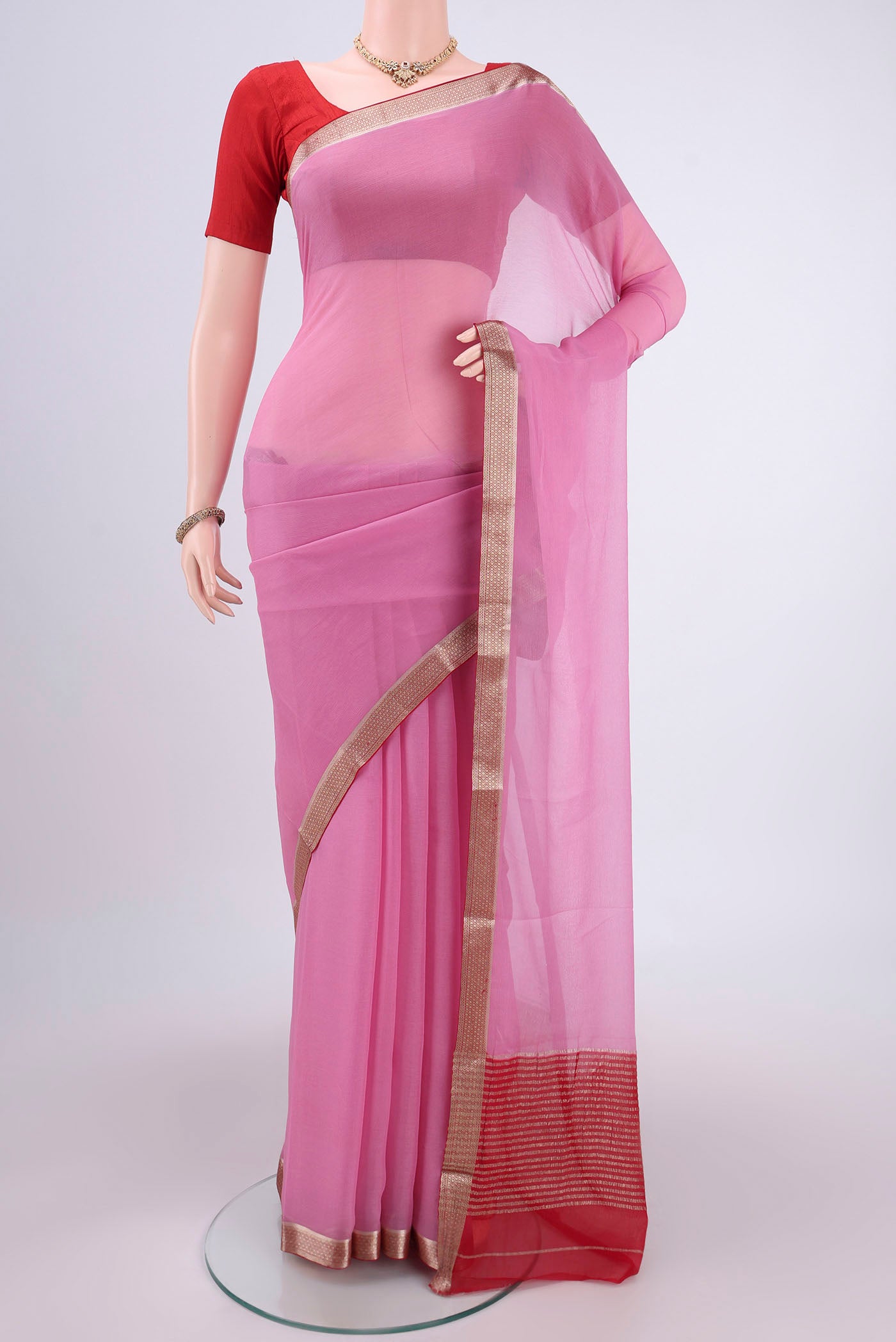 Pink Dual Tone Mysore Chiffon Saree with Plain Body and Zari Border.  displayed on a mannequin