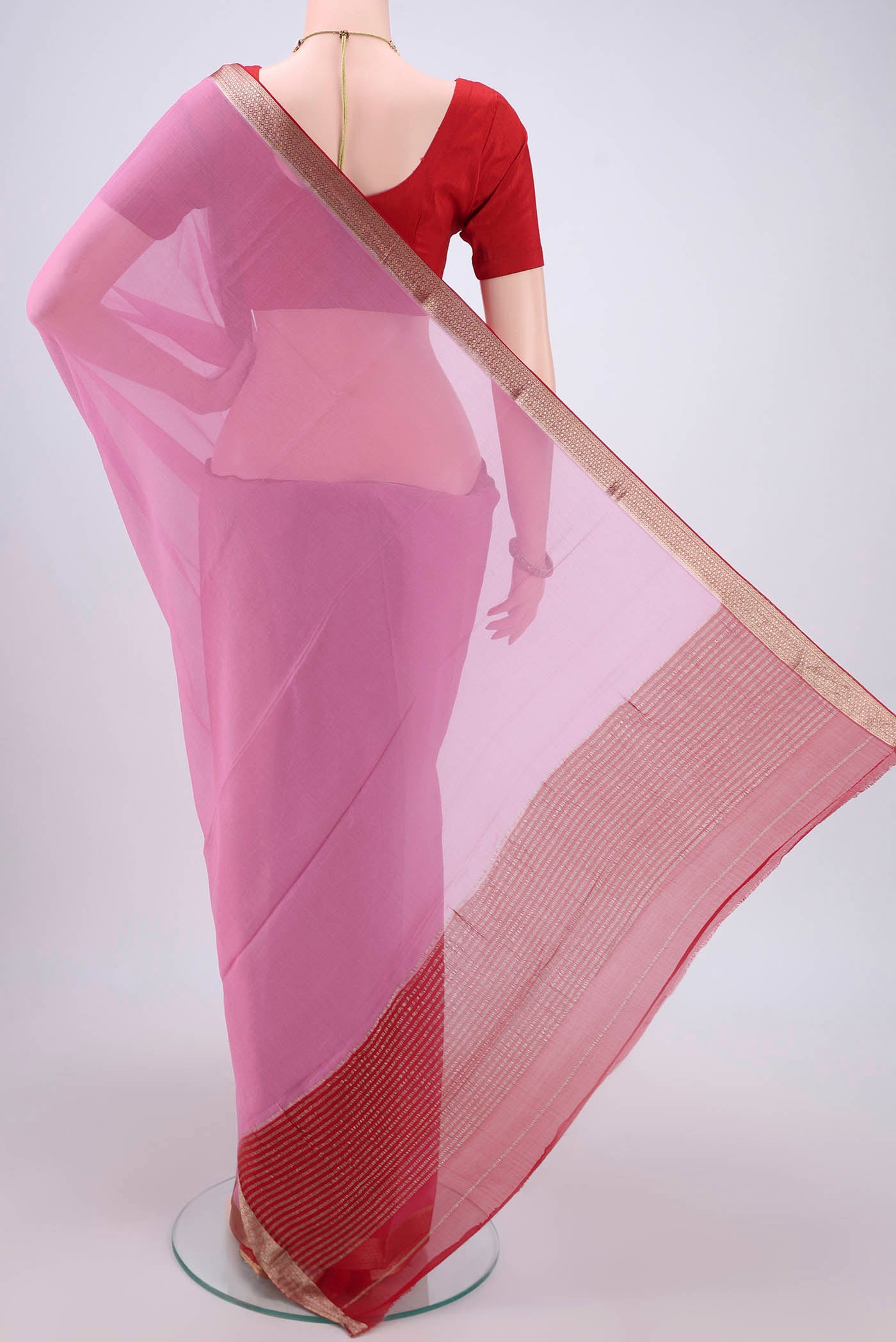Flat view of Pink Dual Tone Mysore Chiffon Saree with Plain Body and Zari Border. 