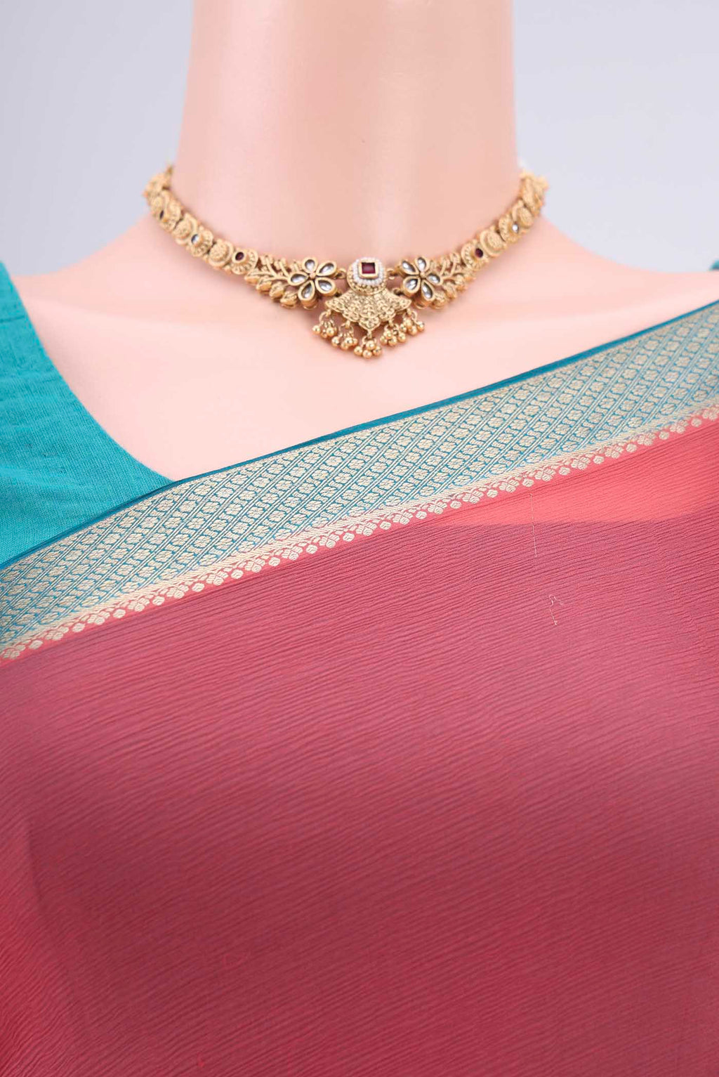 Border image of Peach Mysore Chiffon Saree with Plain Body and Zari Border. 