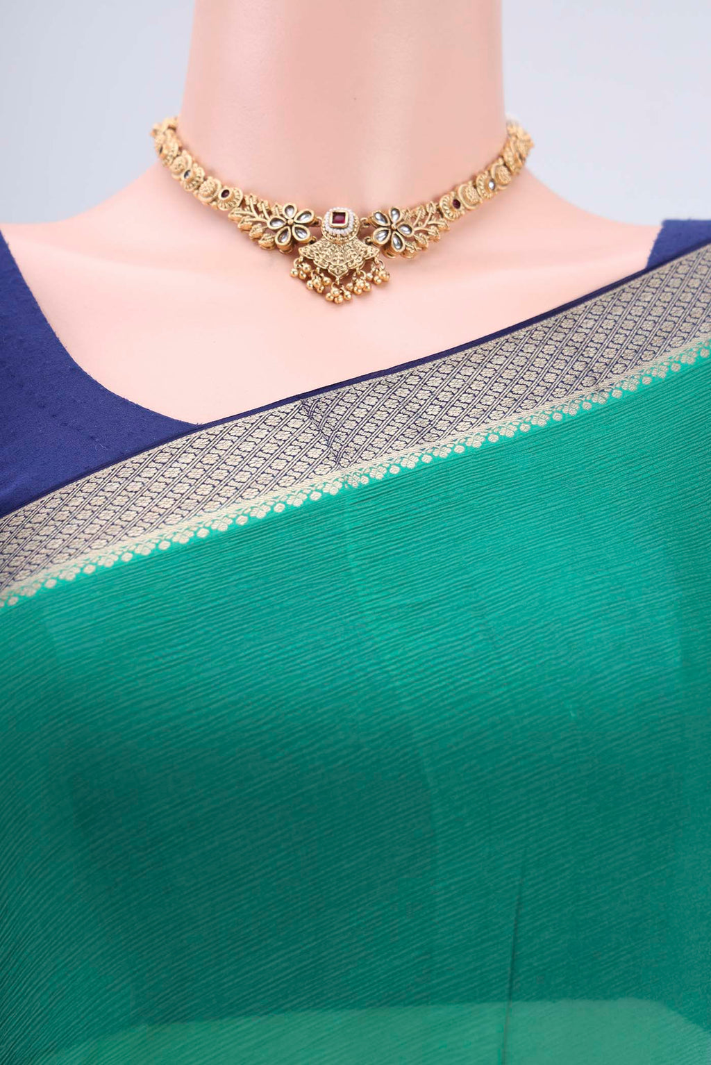 Border image of Sea Green Dual Tone Mysore Chiffon Saree with Plain Body and Zari Border. 