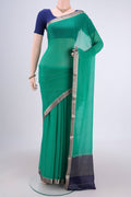 Sea Green Dual Tone Mysore Chiffon Saree with Plain Body and Zari Border.  displayed on a mannequin
