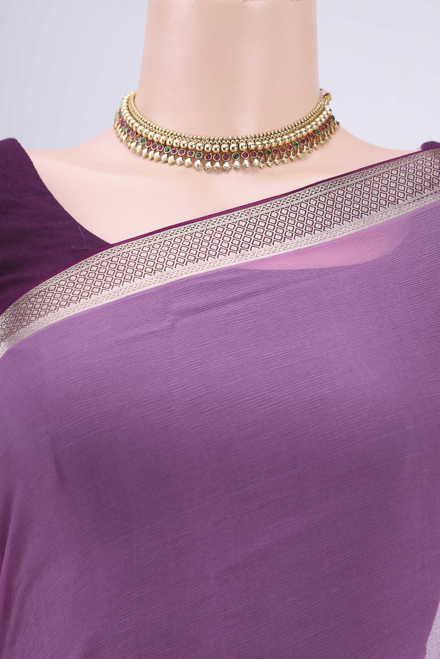 Border image of Mauve Dual Tone Chiffon Saree with Plain Body and Zari Border. 
