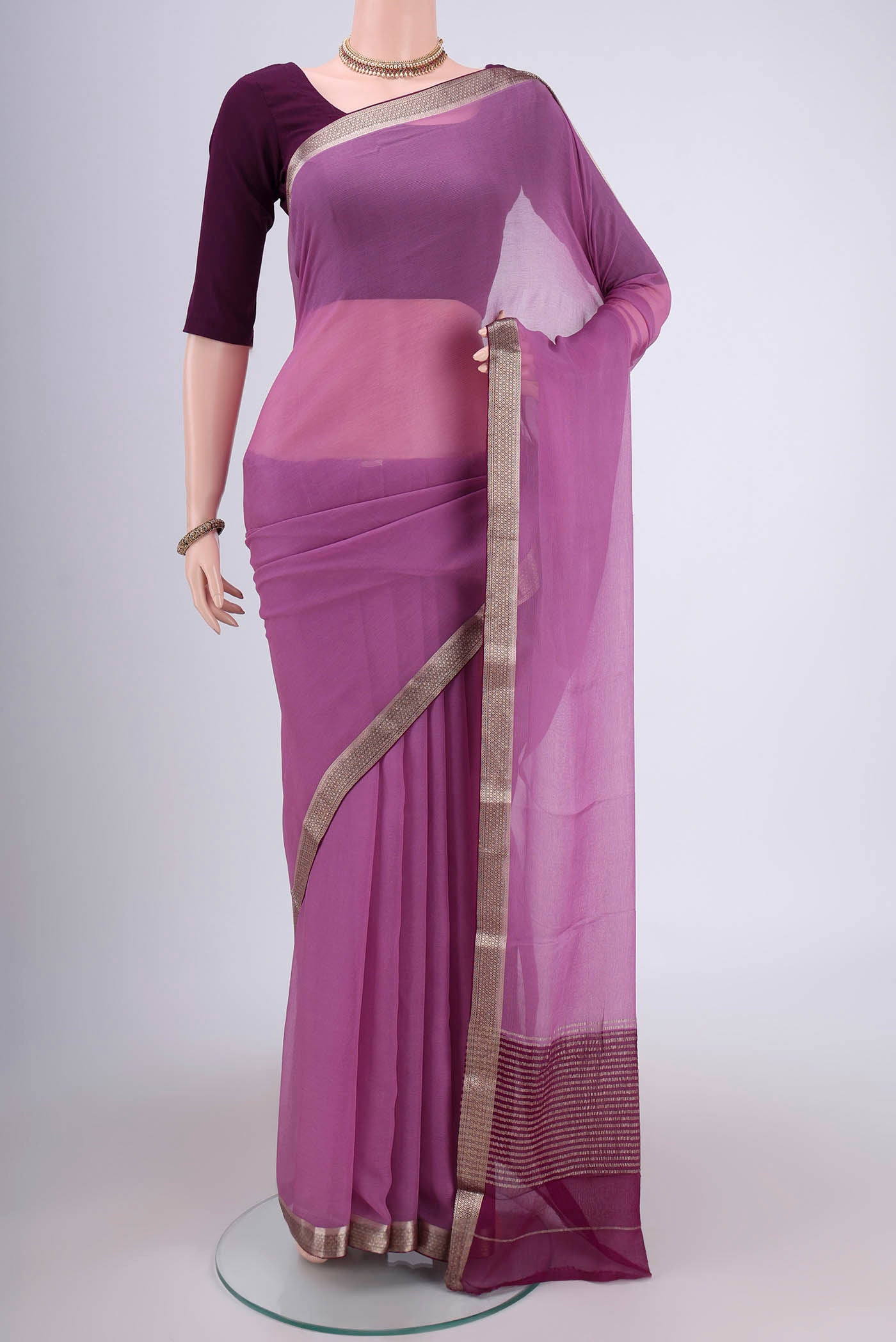 Mauve Dual Tone Chiffon Saree with Plain Body and Zari Border.  displayed on a mannequin
