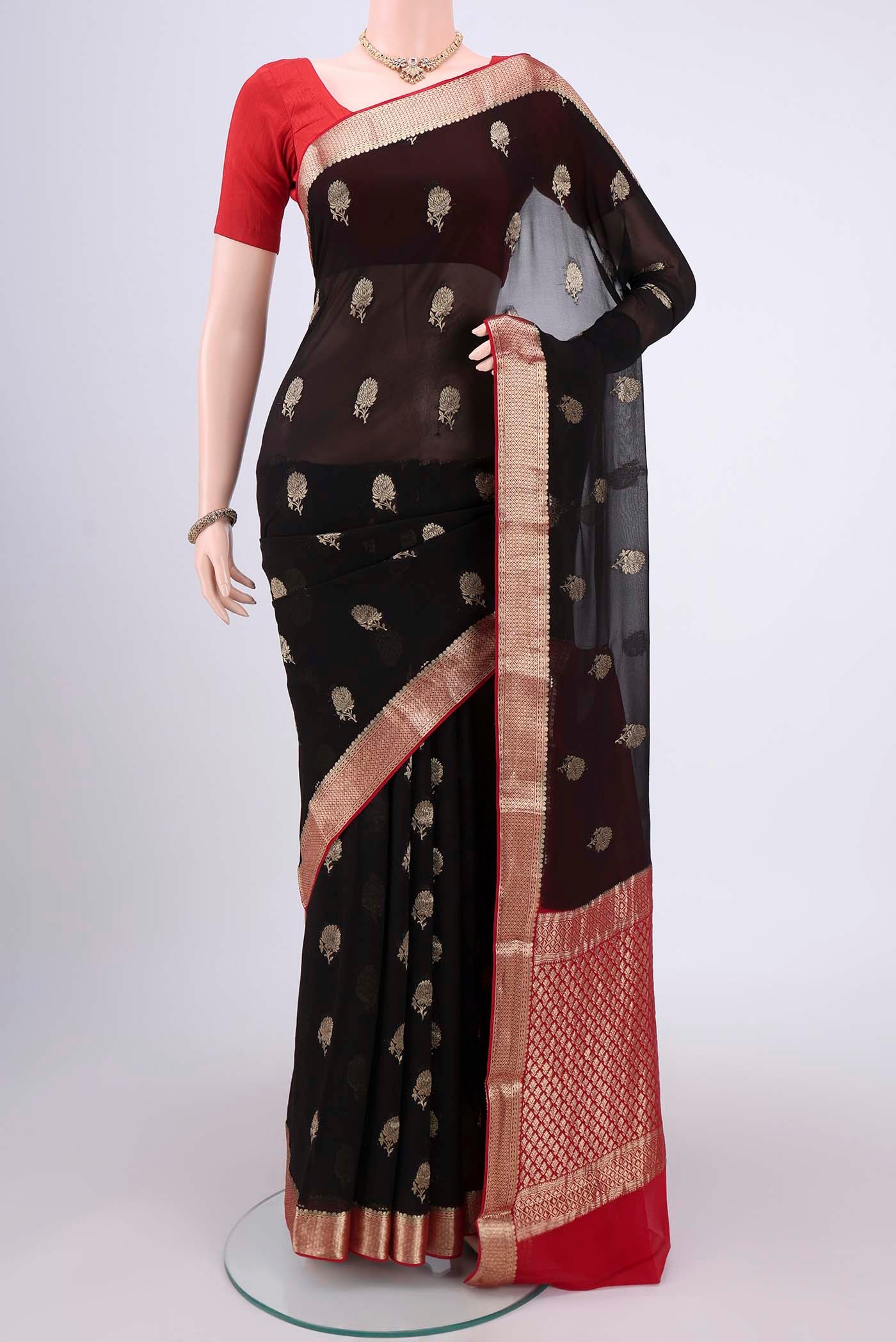 Black Dual Tone Mysore Georgette Saree with Zari Butta on the body and Zari Border.  displayed on a mannequin