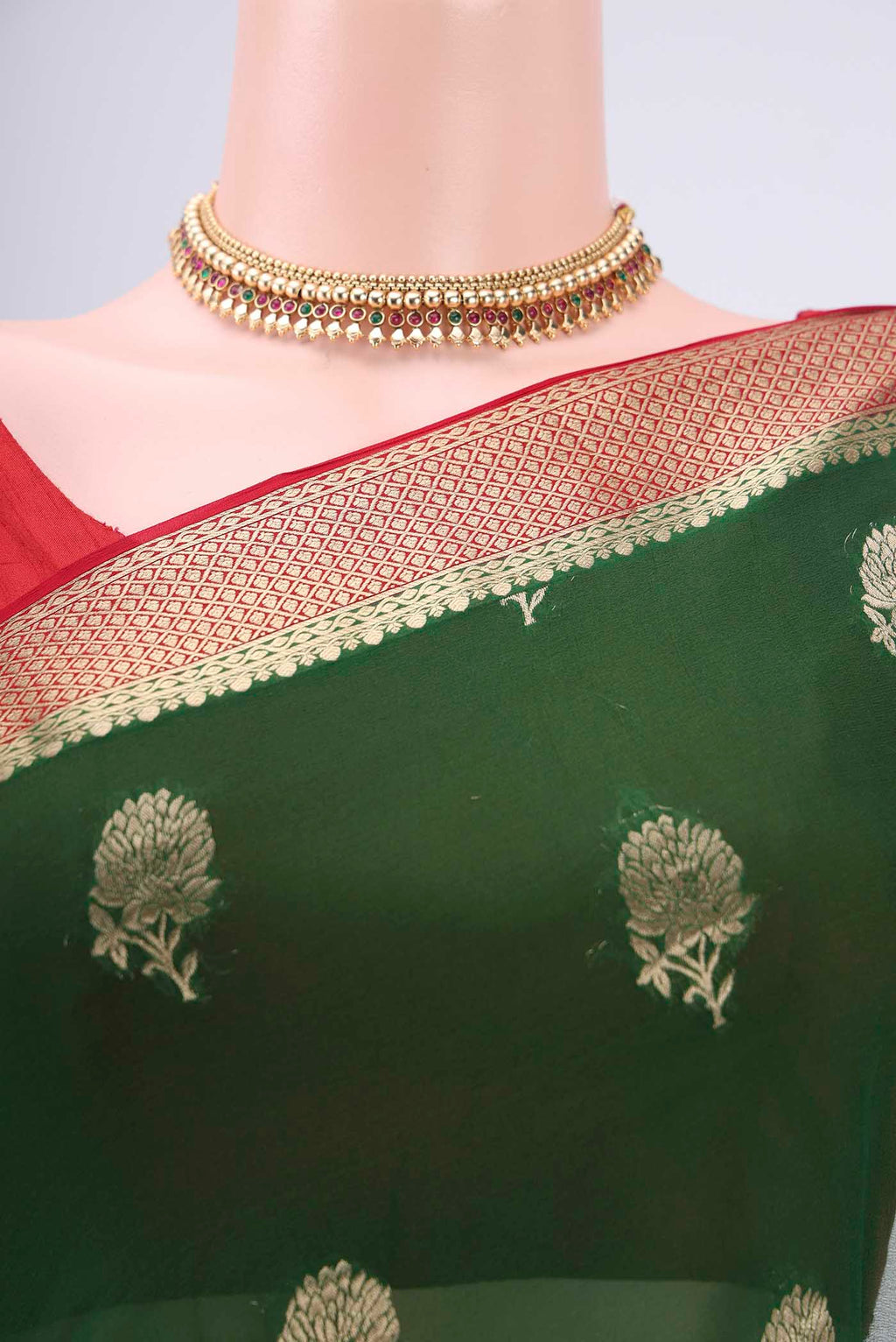 Border image of Green Dual Tone Mysore Georgette Saree with Zari Butta on the body and Zari Border. 