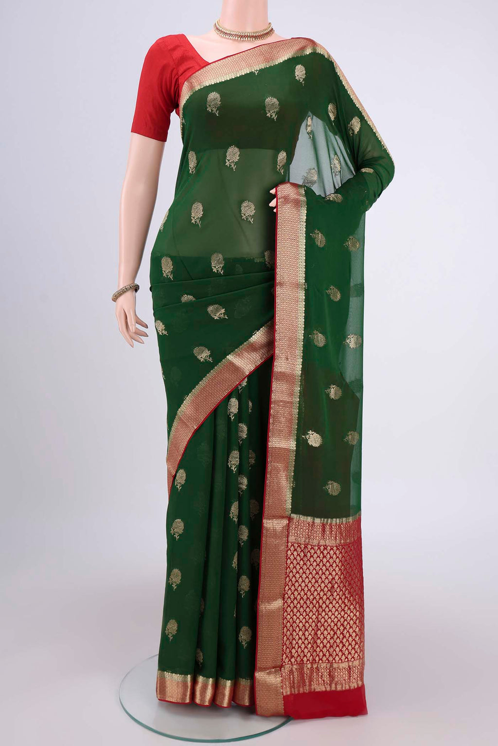 Green Dual Tone Mysore Georgette Saree with Zari Butta on the body and Zari Border.  displayed on a mannequin