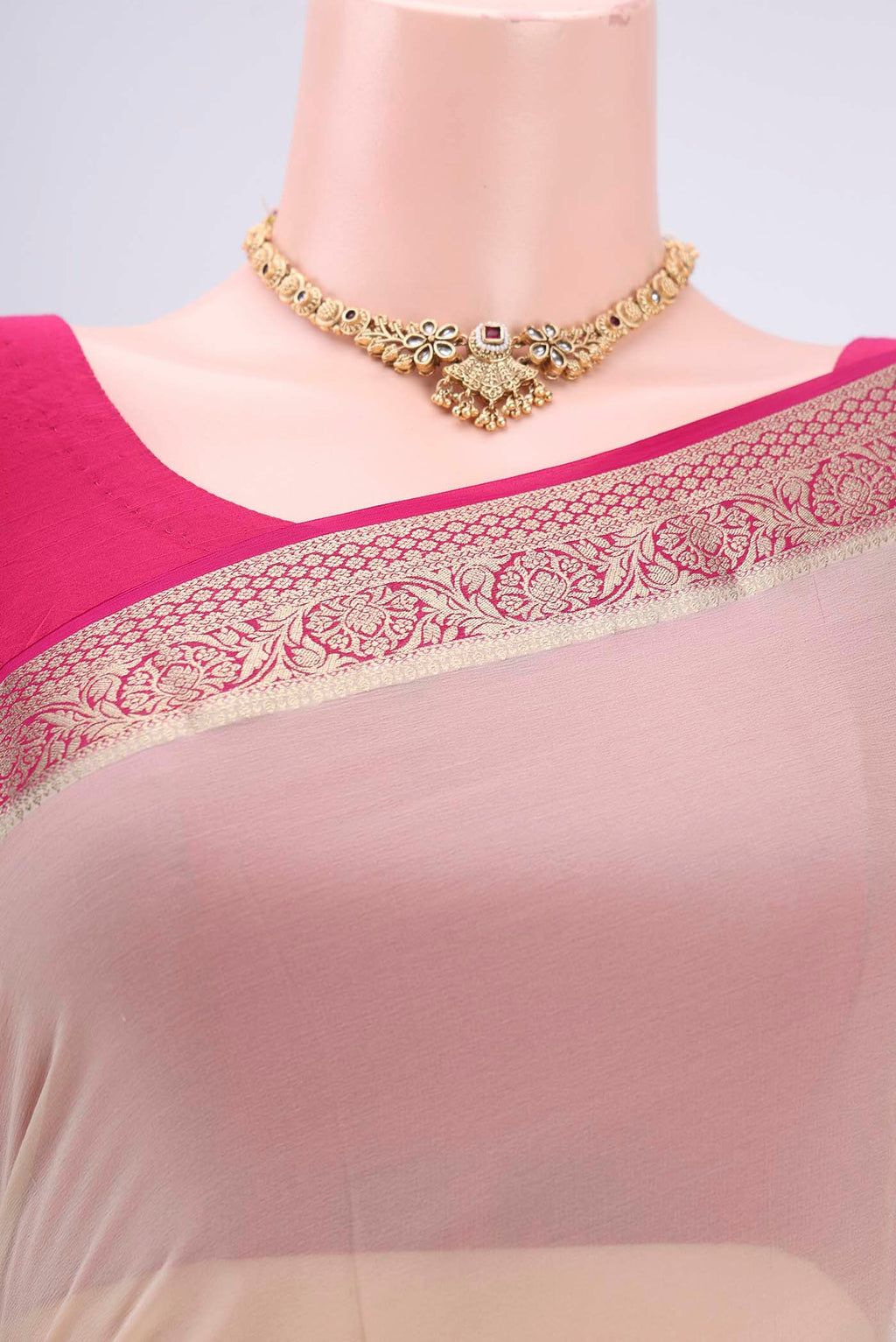Border image of Cream Dual Tone Mysore Georgette Saree with Plain Body and Zari Border. 