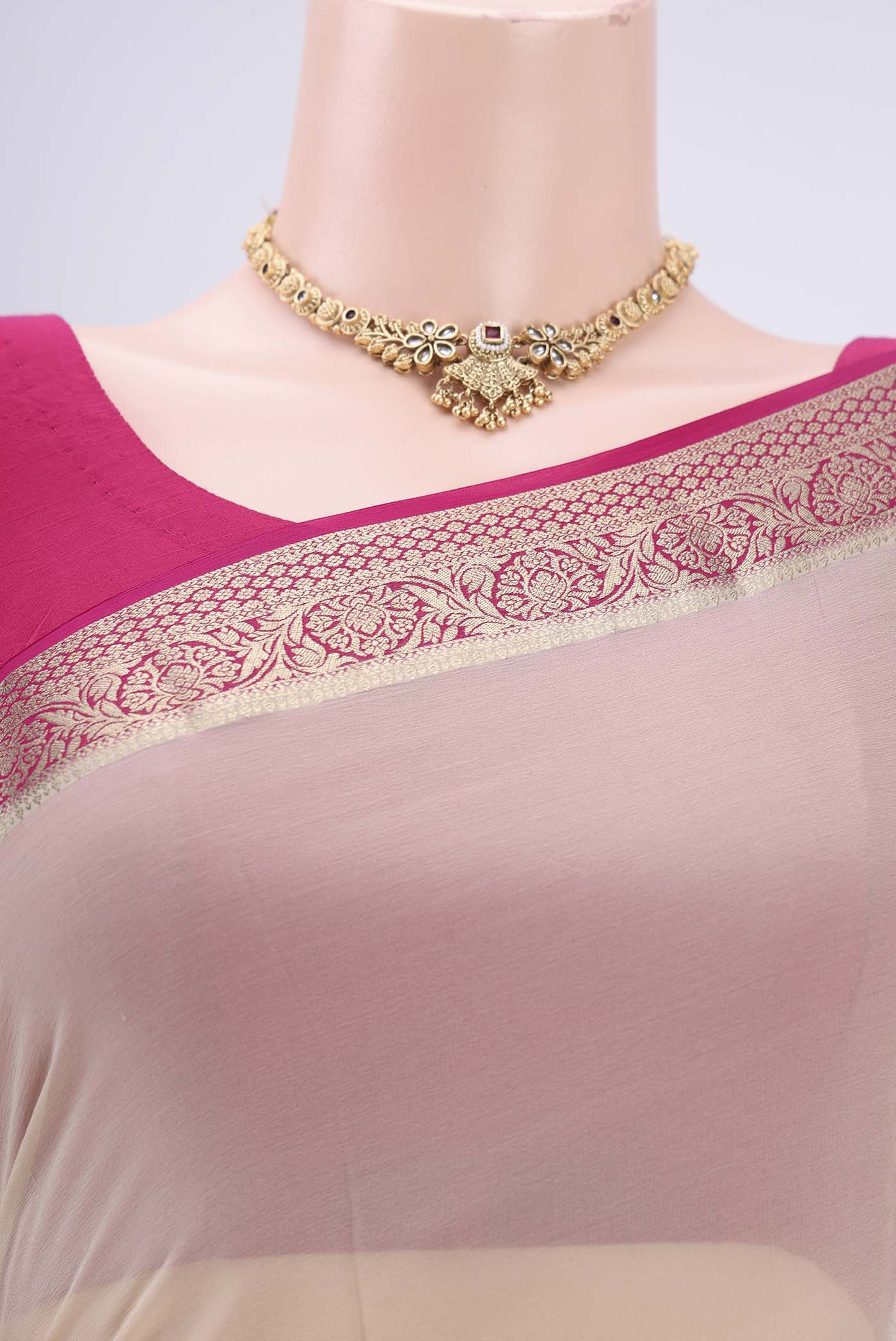 Border image of Cream Dual Tone Mysore Georgette Saree with Plain Body and Zari Border. 
