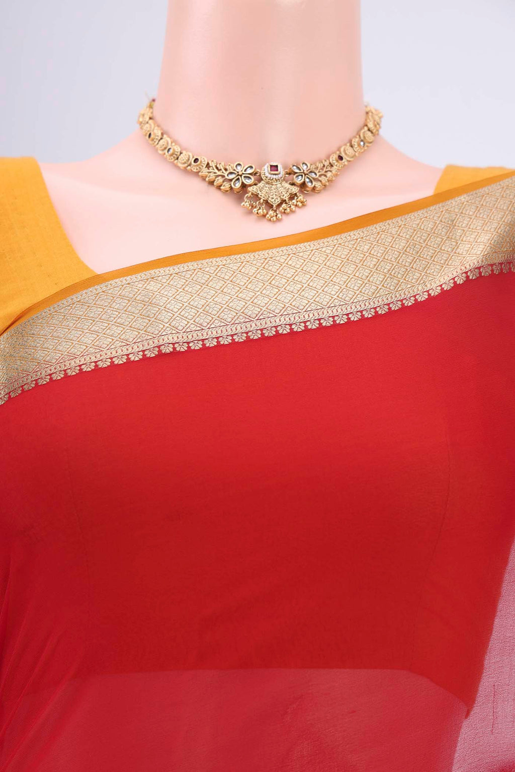 Border image of Deep Red Dual Tone Mysore Georgette Saree with Plain Body and Zari Border. 