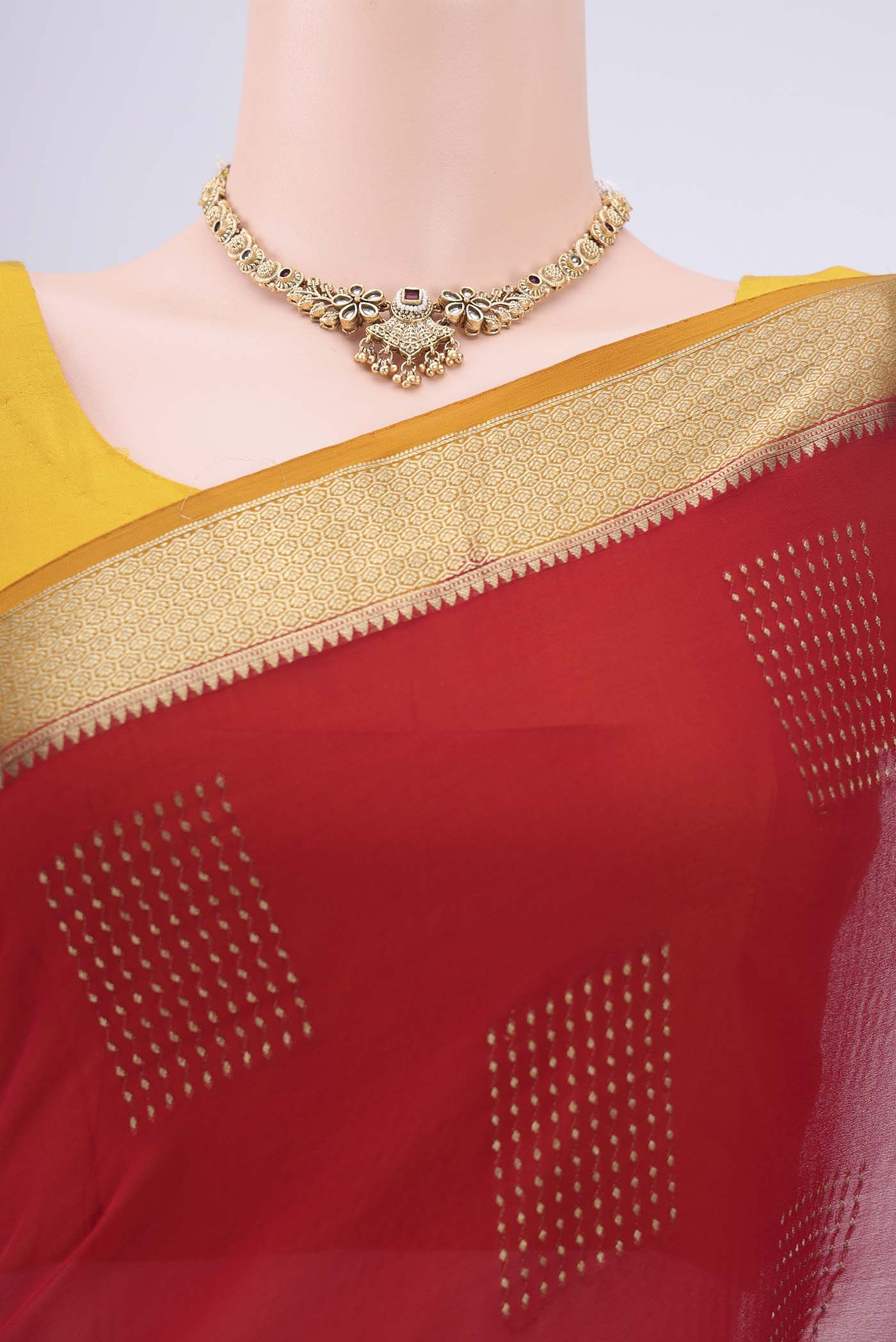 Border image of Maroon Mysore Georgette Saree with Zari Butta on the body and Zari Border. 