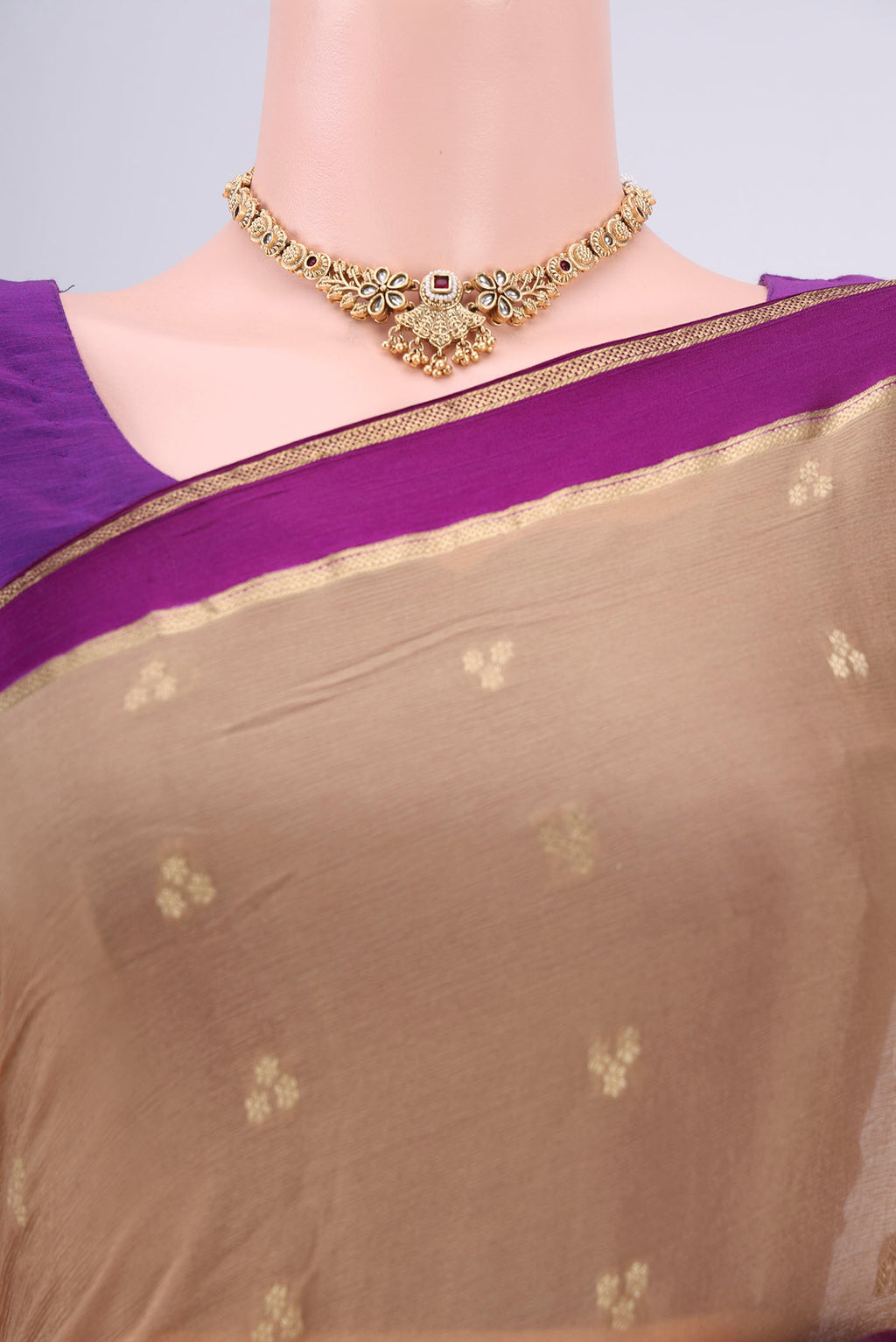 Border image of Dark Beige Mysore Chiffon Saree with Zari Butta on the body and Zari Border. 