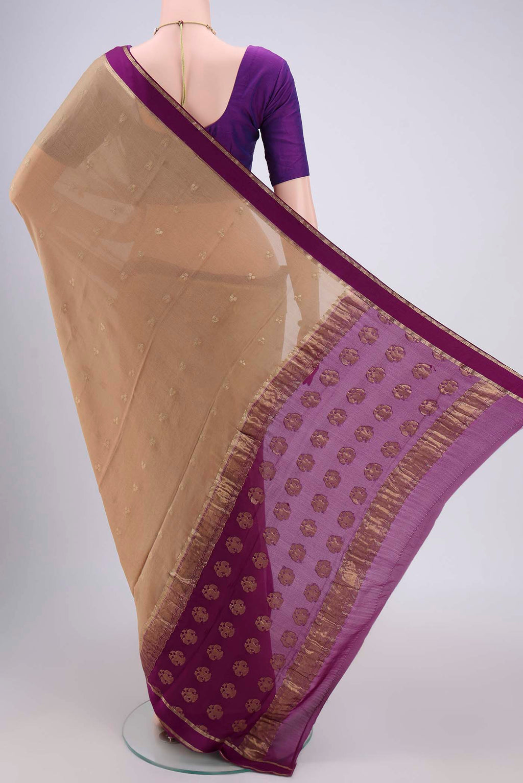 Flat view of Dark Beige Mysore Chiffon Saree with Zari Butta on the body and Zari Border. 