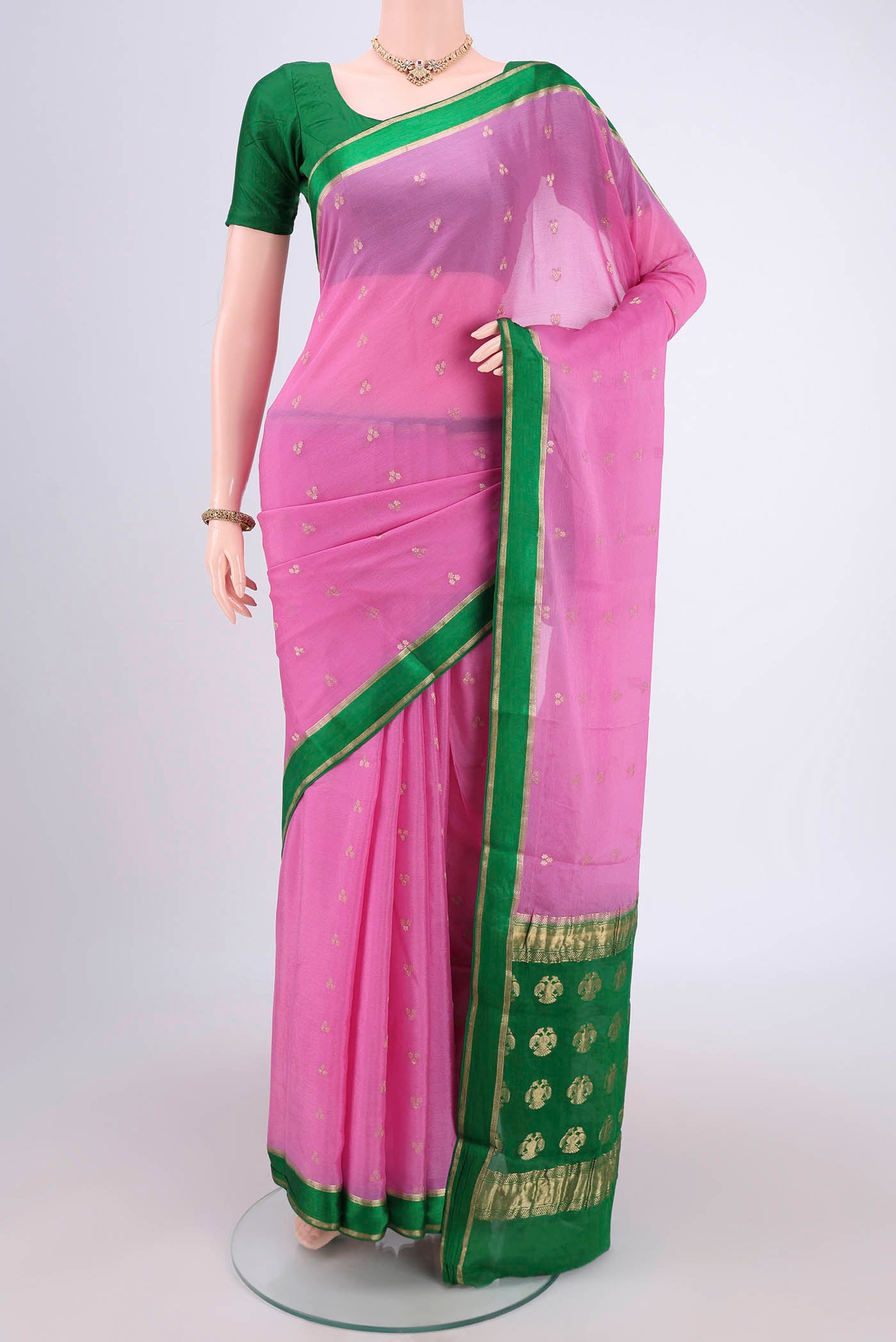 Rose pink Mysore Chiffon Saree with Zari Butta on the body and Zari Border.  displayed on a mannequin