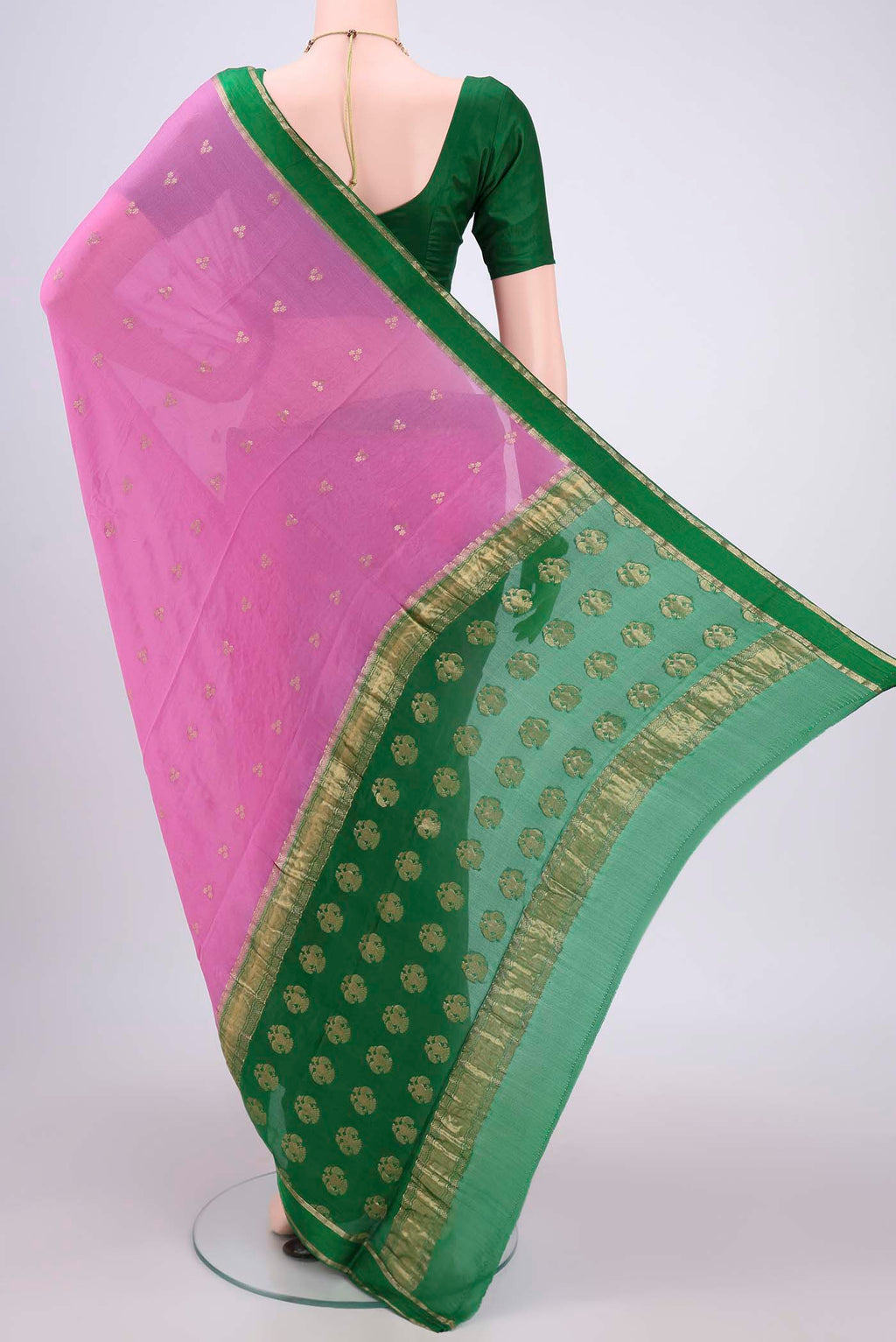 Flat view of Rose pink Mysore Chiffon Saree with Zari Butta on the body and Zari Border. 