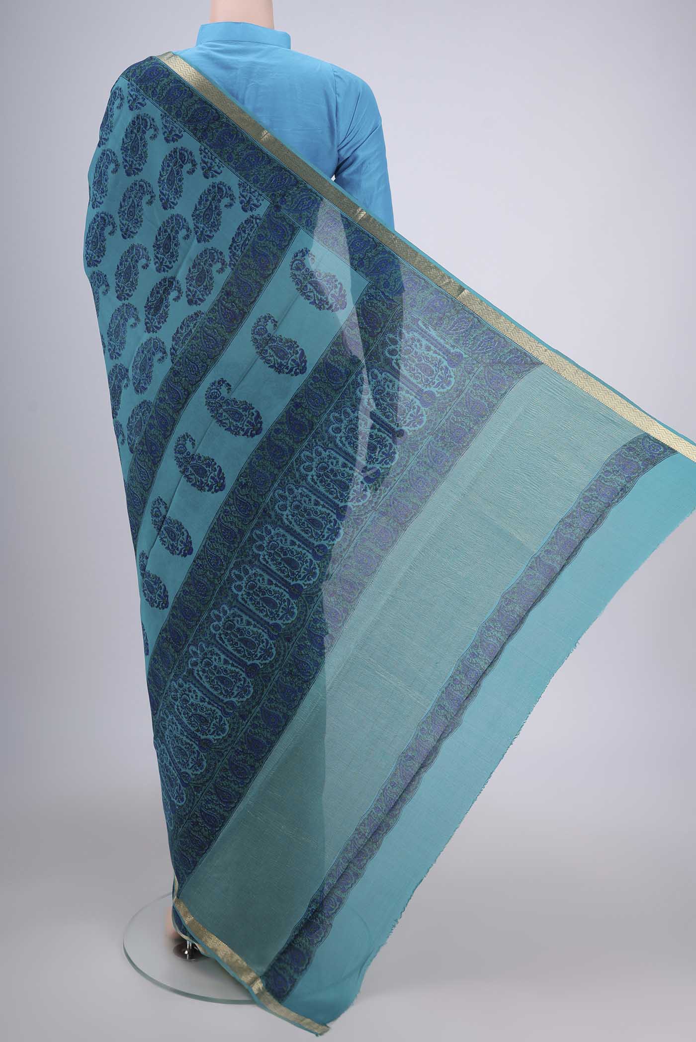 Flat view of Teal Mysore Crepe Saree with Floral Print on the body and Zari Border. 