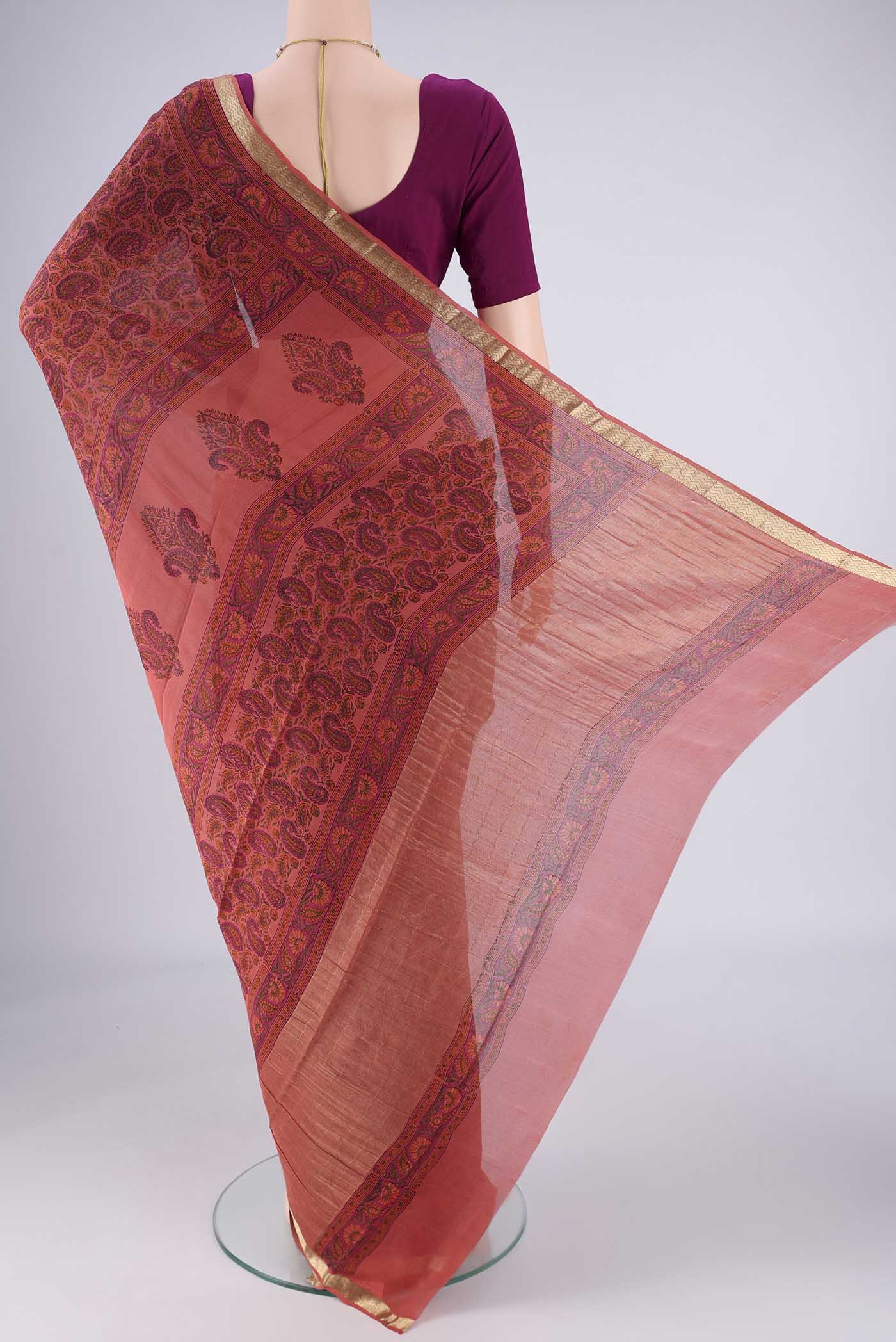 Flat view of Coral Mysore Crepe Saree with Printed design on the body and Zari Border. 