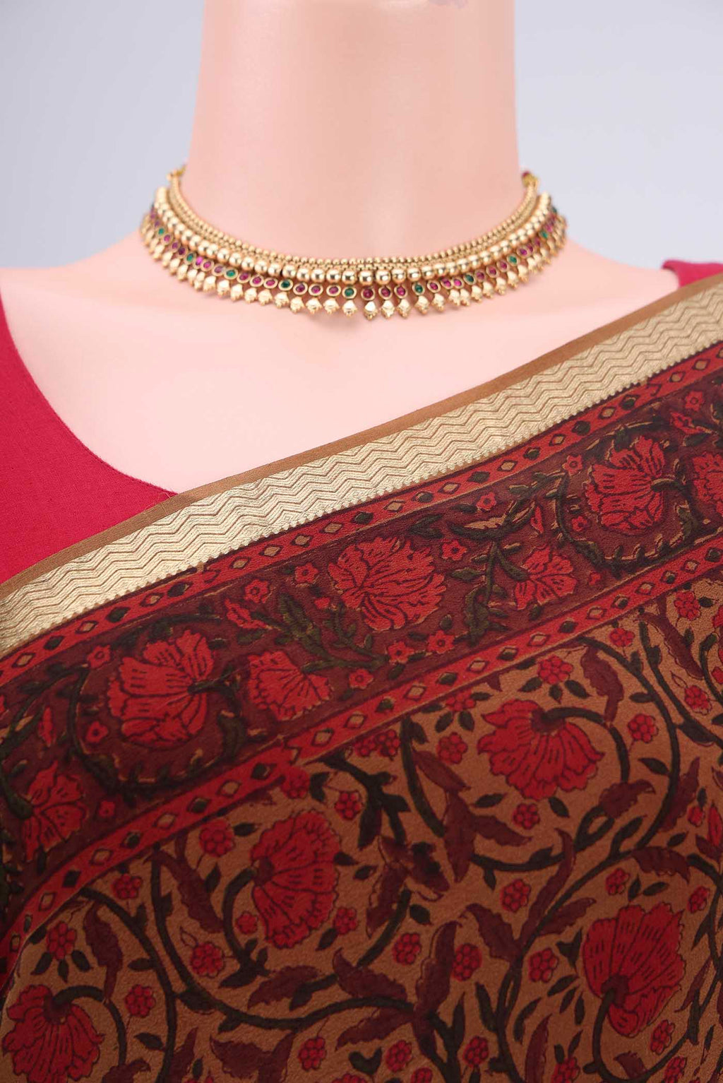 Border image of Dark Beige Mysore Crepe Saree with Floral Print on the body and Zari Border. 