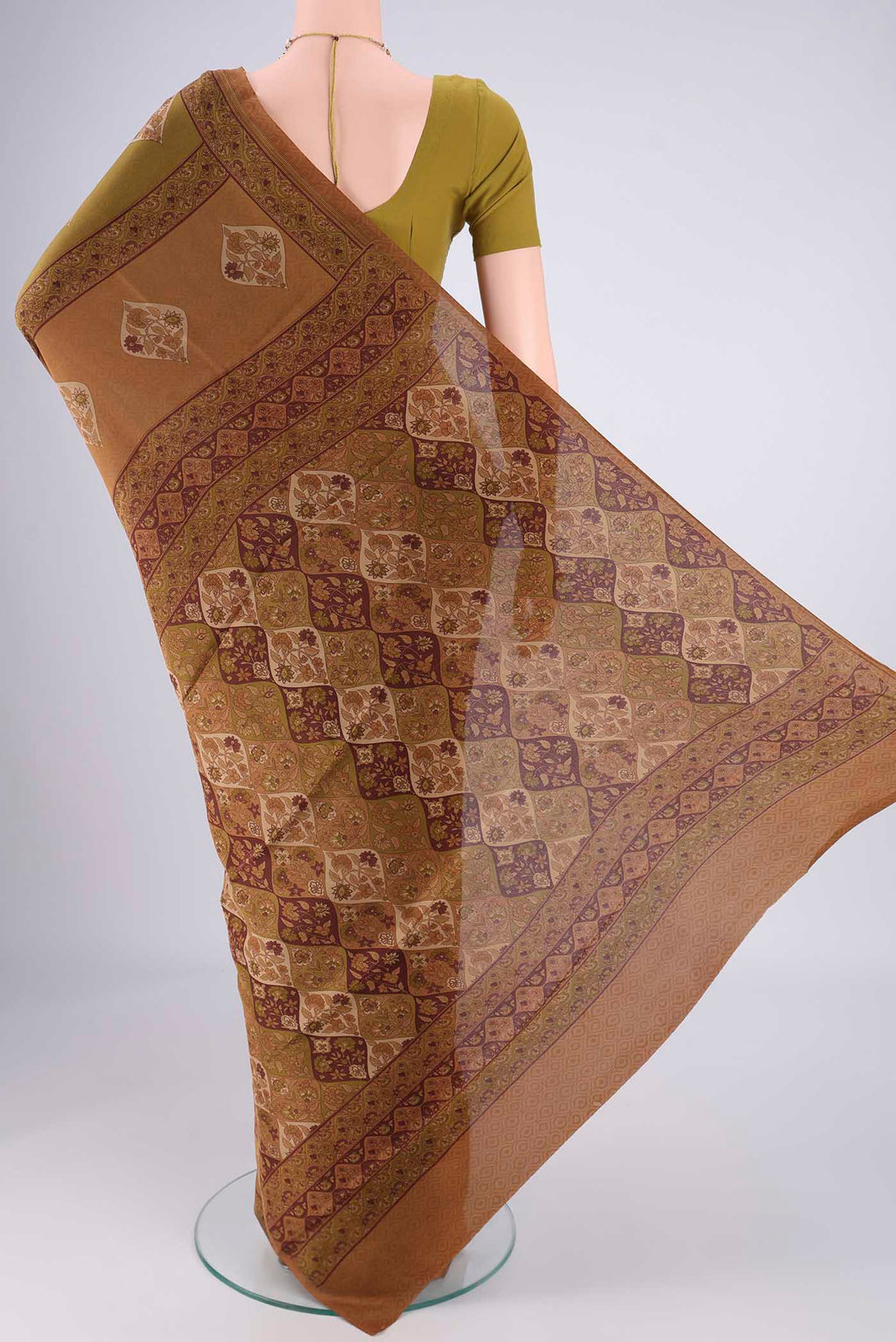 Flat view of Brown Mysore Crepe Saree with Geometric Print on the body and Printed Border. 