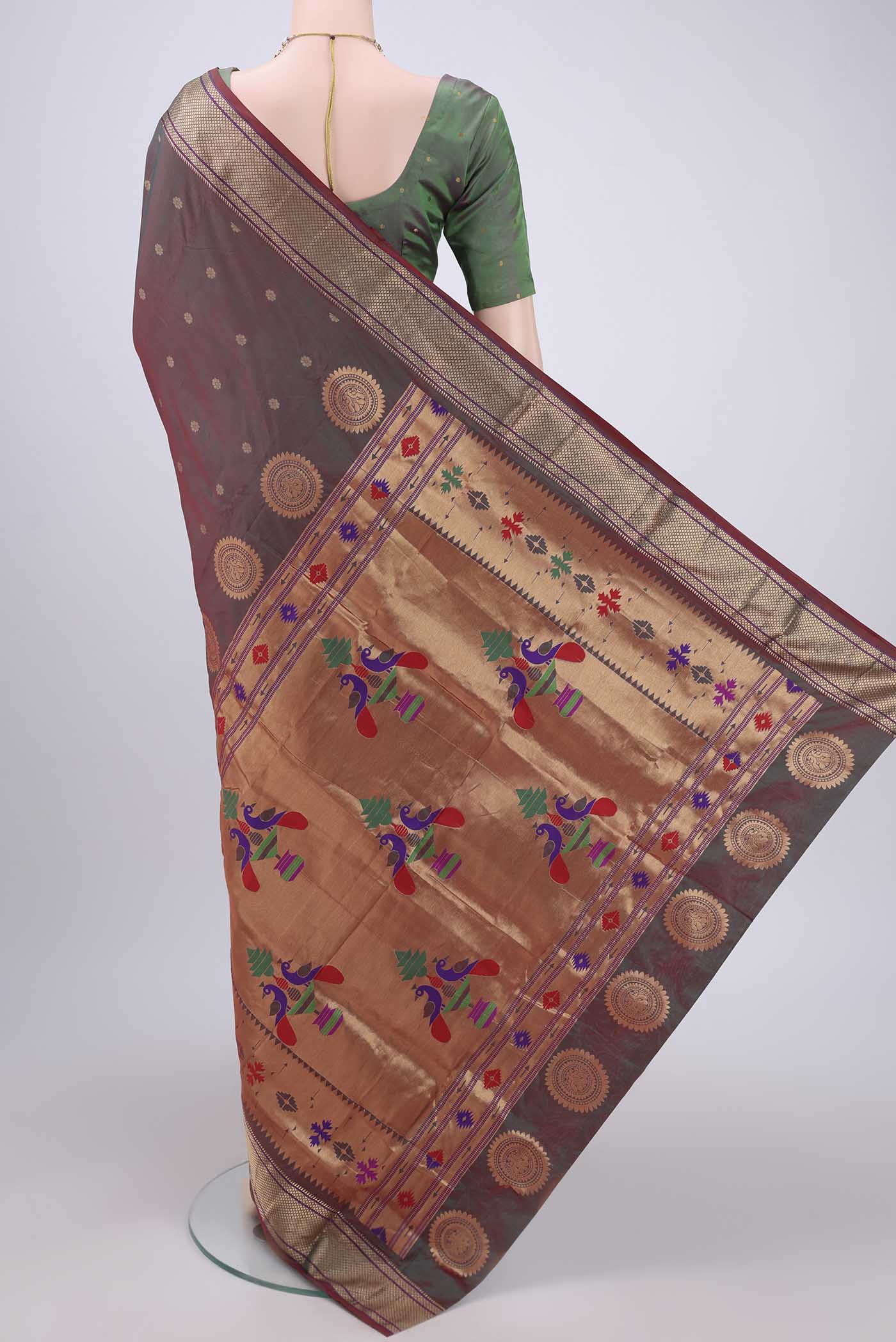 Flat view of Maroon Dual Tone Blended Bangalore Silk Saree with Zari Butta on the body and Paithani Border. 