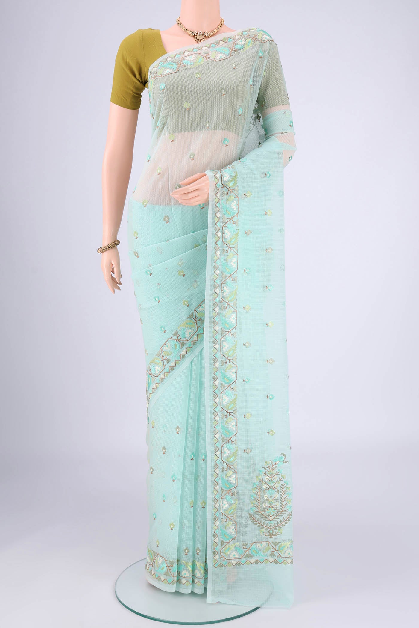 Sky Blue Blended Kota Cotton Saree with Embroidery on the body and Thread Border.  displayed on a mannequin