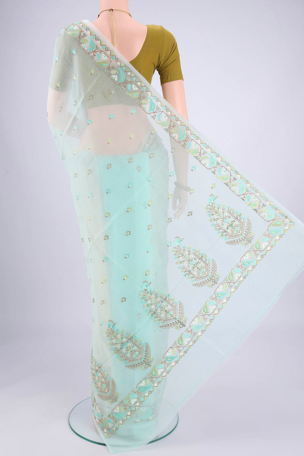 Flat view of Sky Blue Blended Kota Cotton Saree with Embroidery on the body and Thread Border. 