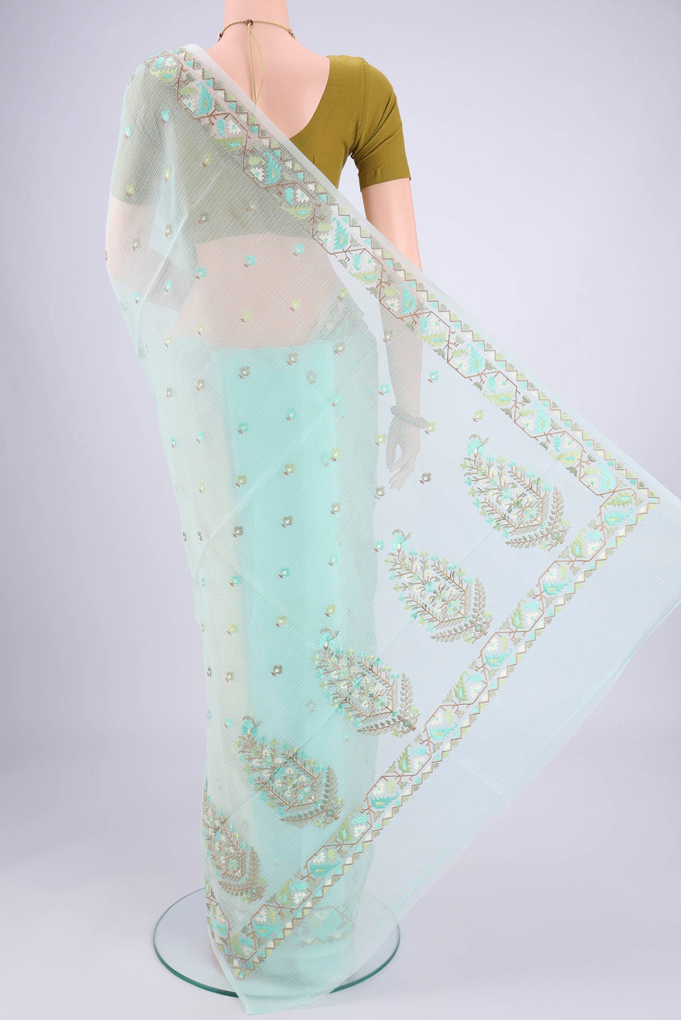 Flat view of Sky Blue Blended Kota Cotton Saree with Embroidery on the body and Thread Border. 