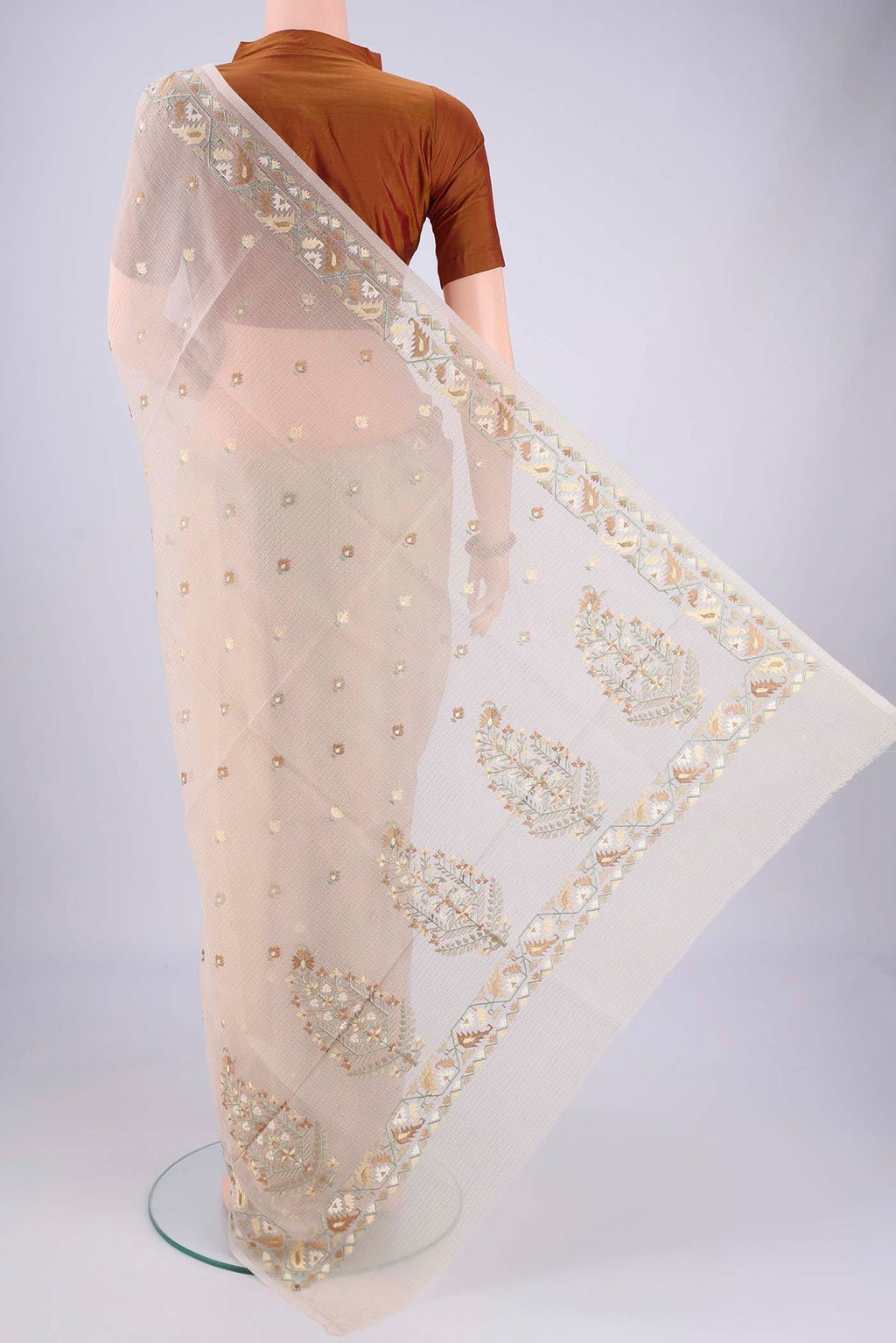 Flat view of Beige Blended Kota Cotton Saree with Embroidery on the body and Thread Border. 