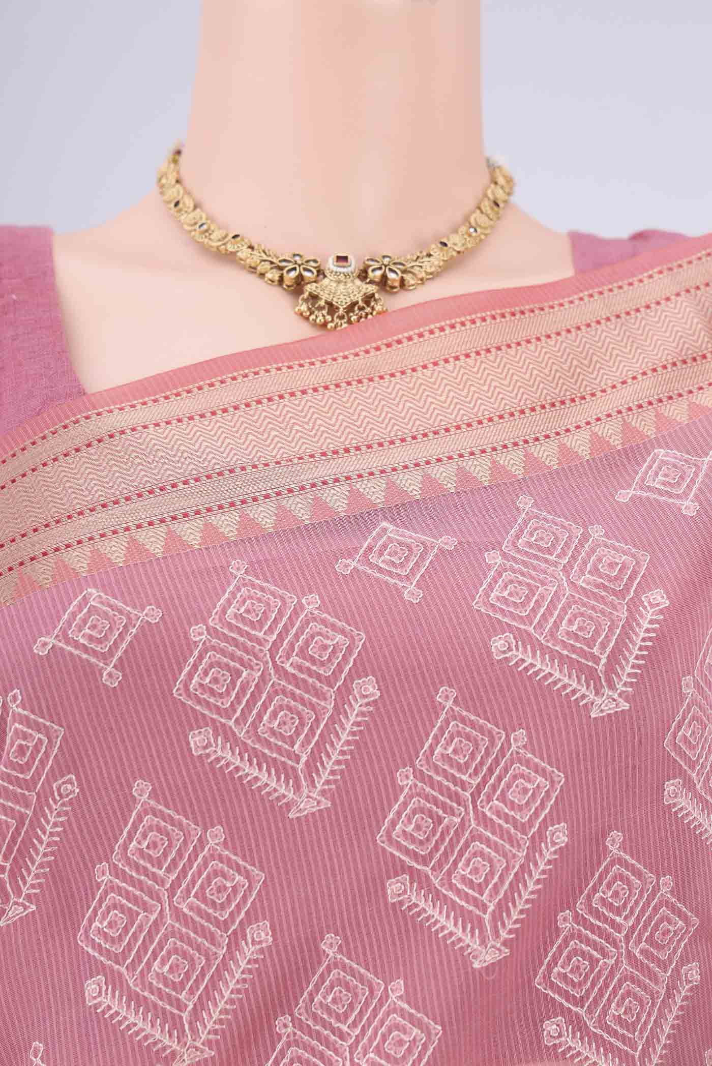 Border image of Pink Blended Kota Cotton Saree with Embroidery on the body and Thread Border. 