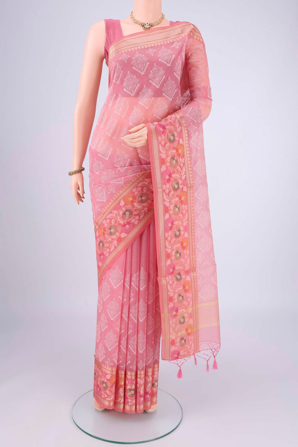 Pink Blended Kota Cotton Saree with Embroidery on the body and Thread Border.  displayed on a mannequin
